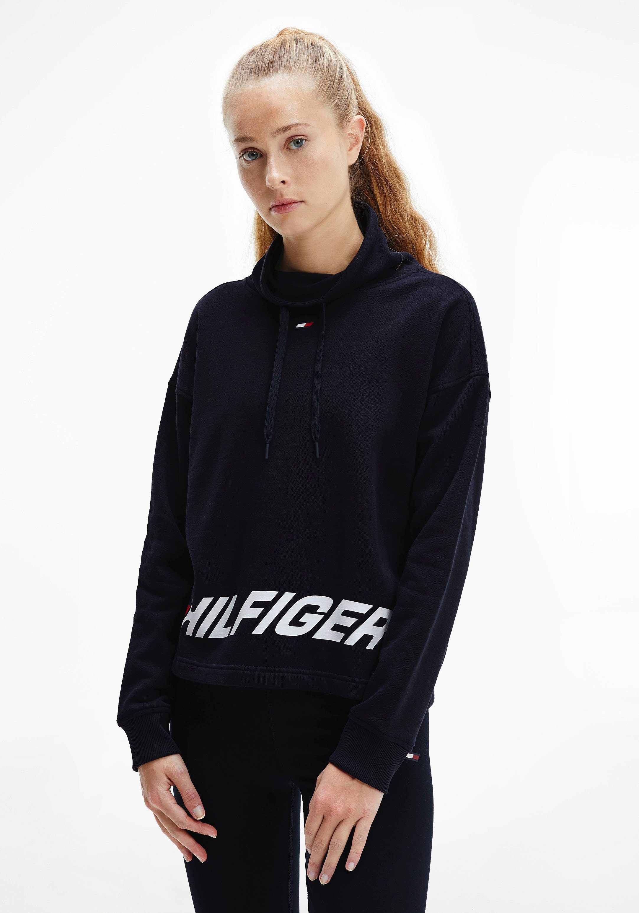 Tommy Hilfiger Sport Sweatshirt »RLX WRAPPED PRINT SWEATSHIRT« mit großem  Tommy Hilfiger Sport Logo-Schriftzug am Saum