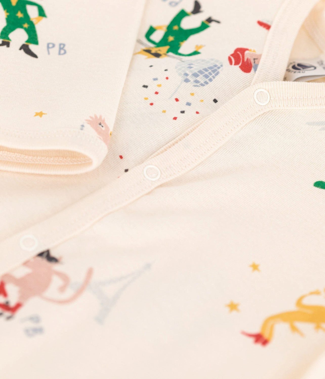 Petit Bateau Strampler Petit Bateau Langarm Overall Allover Fantasy Print