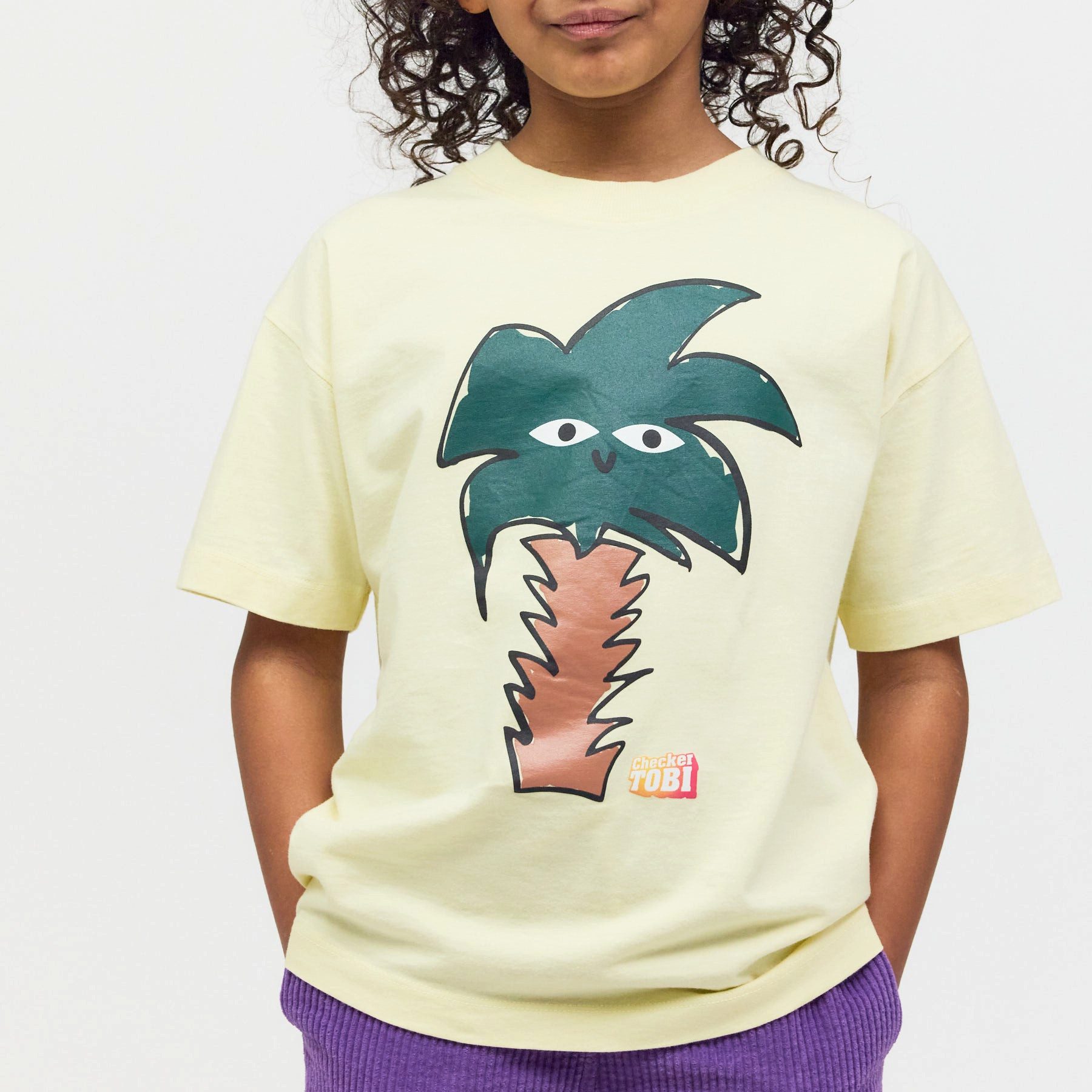 PlayPlayPauly T-Shirt CHECKER TOBI Palme Unisex Kinder T-Shirt aus Bio-Baumwolle Kinder-T-Shirt aus 100% Bio-Baumwolle mit Palmen-Print