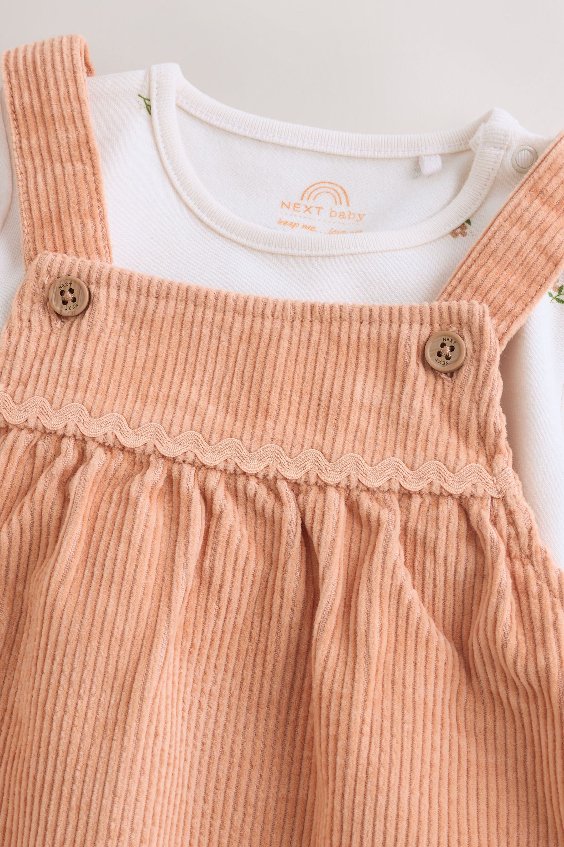 Next Latzkleid 2-teiliges Baby-Set mit Bodysuit + Trägerkleid (2-tlg)