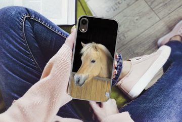 MuchoWow Handyhülle Fjordpferd in einem Holzstall, Handyhülle Apple iPhone XR, Smartphone-Bumper, Print, Handy