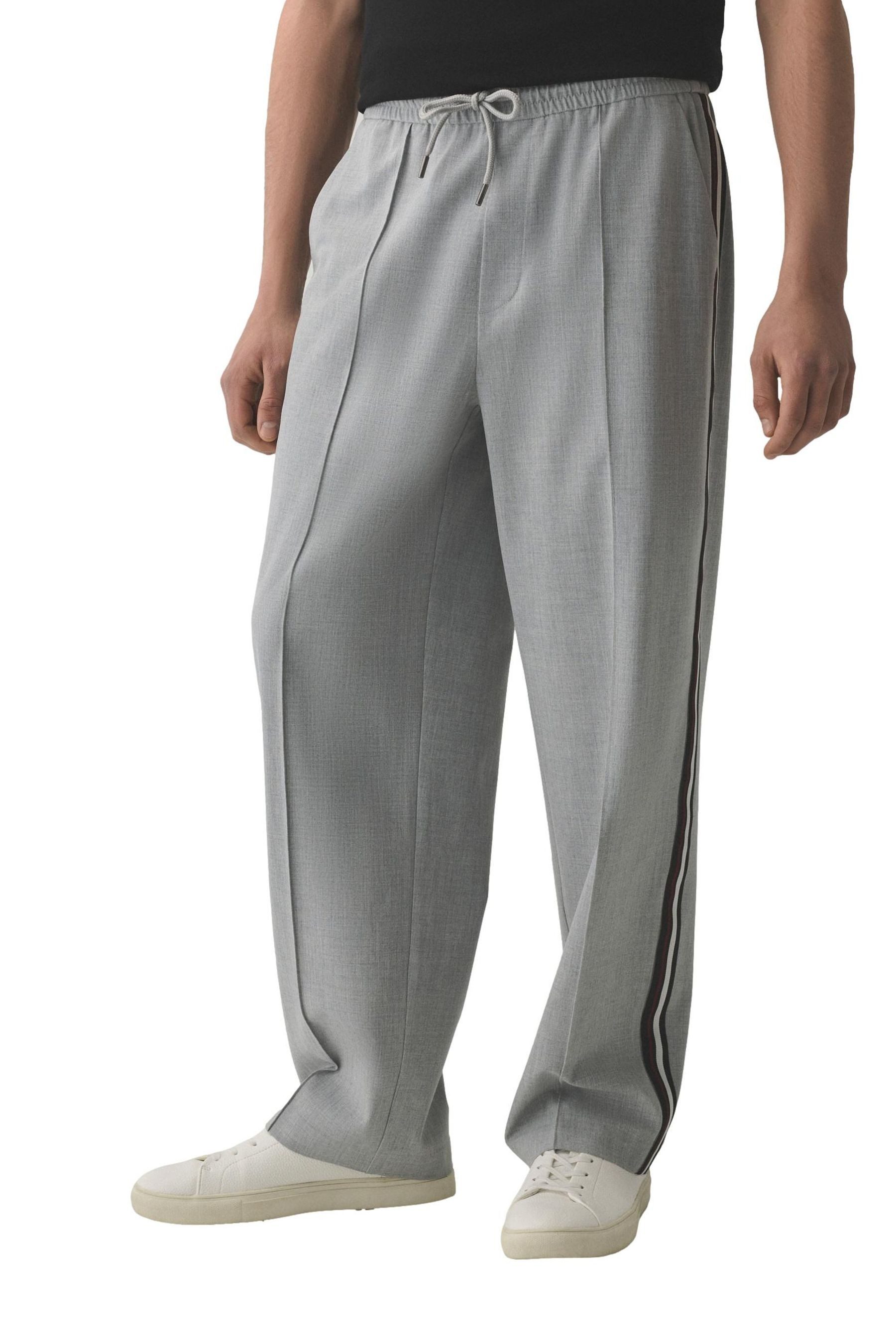 Stoffhose Elegante Jogginghose mit Seitenstreifen