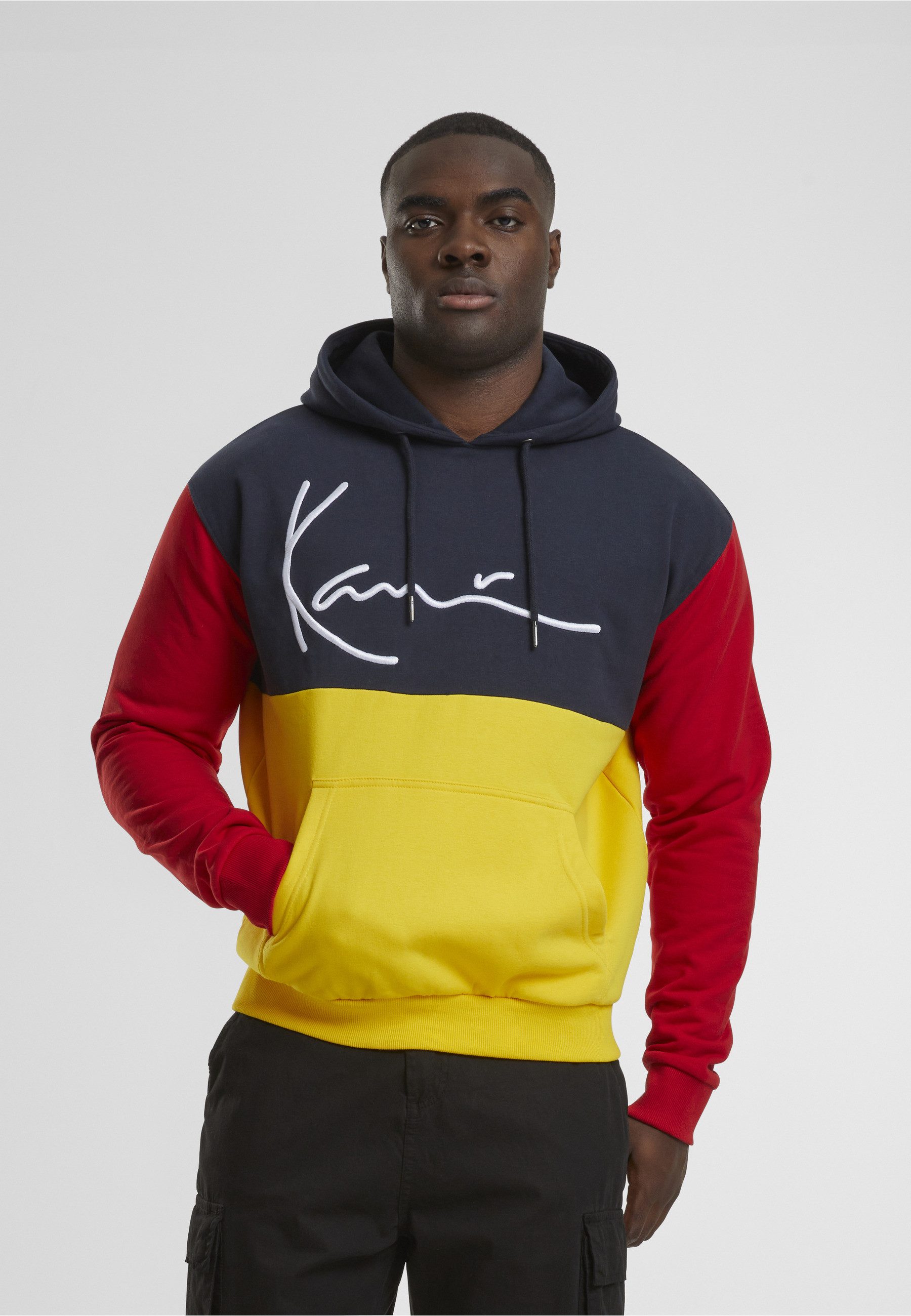 Karl Kani Kapuzensweatshirt Karl Kani Signature Block Teddy Hoodie yellow/navy/red (1-tlg)