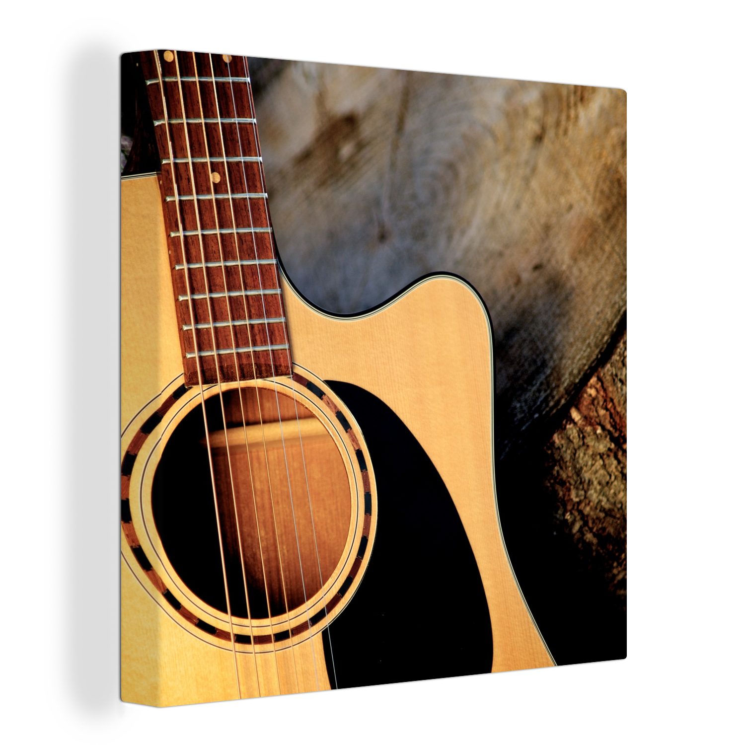 OneMillionCanvasses® Leinwandbild Eine akustische Gitarre auf einem Holzsockel, (1 St), Leinwand Bilder für Wohnzimmer Schlafzimmer