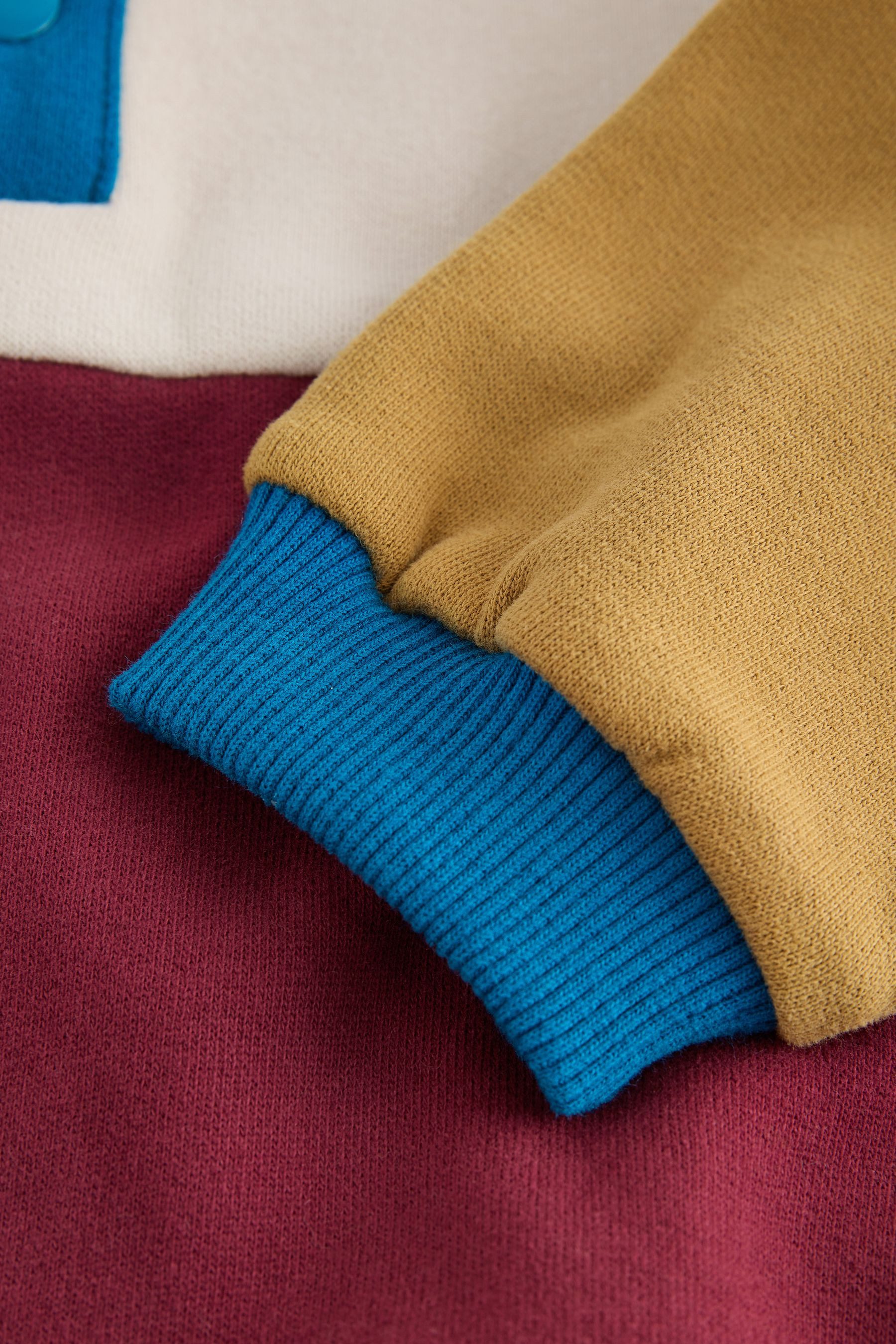 Next Sweater Oberteil mit Farbblock und Druckknopf-Ausschnitt (1-tlg)