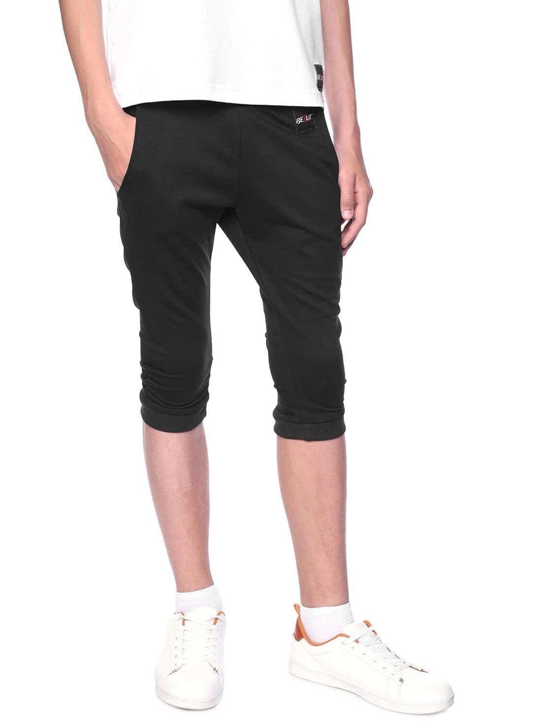 BEZLIT Strandshorts Kinder Jungen Stoff Capri Shorts (1-tlg) mit elastischem Bund Schwarz
