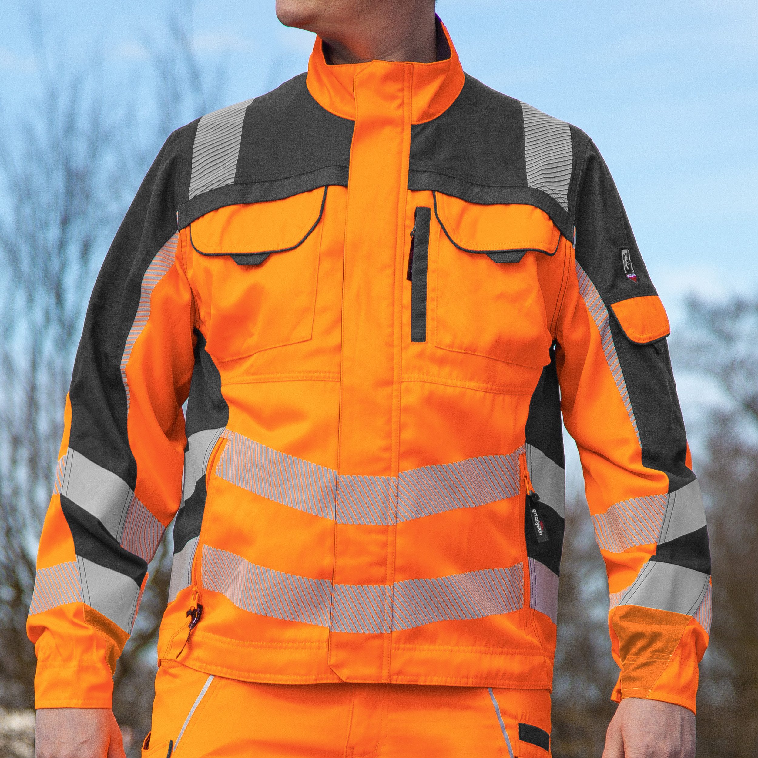 Qualitex Workwear Arbeitsjacke ungefütterte Warnschutz-Bundjacke (PSA Kat 2) aus Lyocell & Cordura (1-St) moderne, strapazierfähige Werkstattjacke mit 7 Taschen - Atmungsaktiv