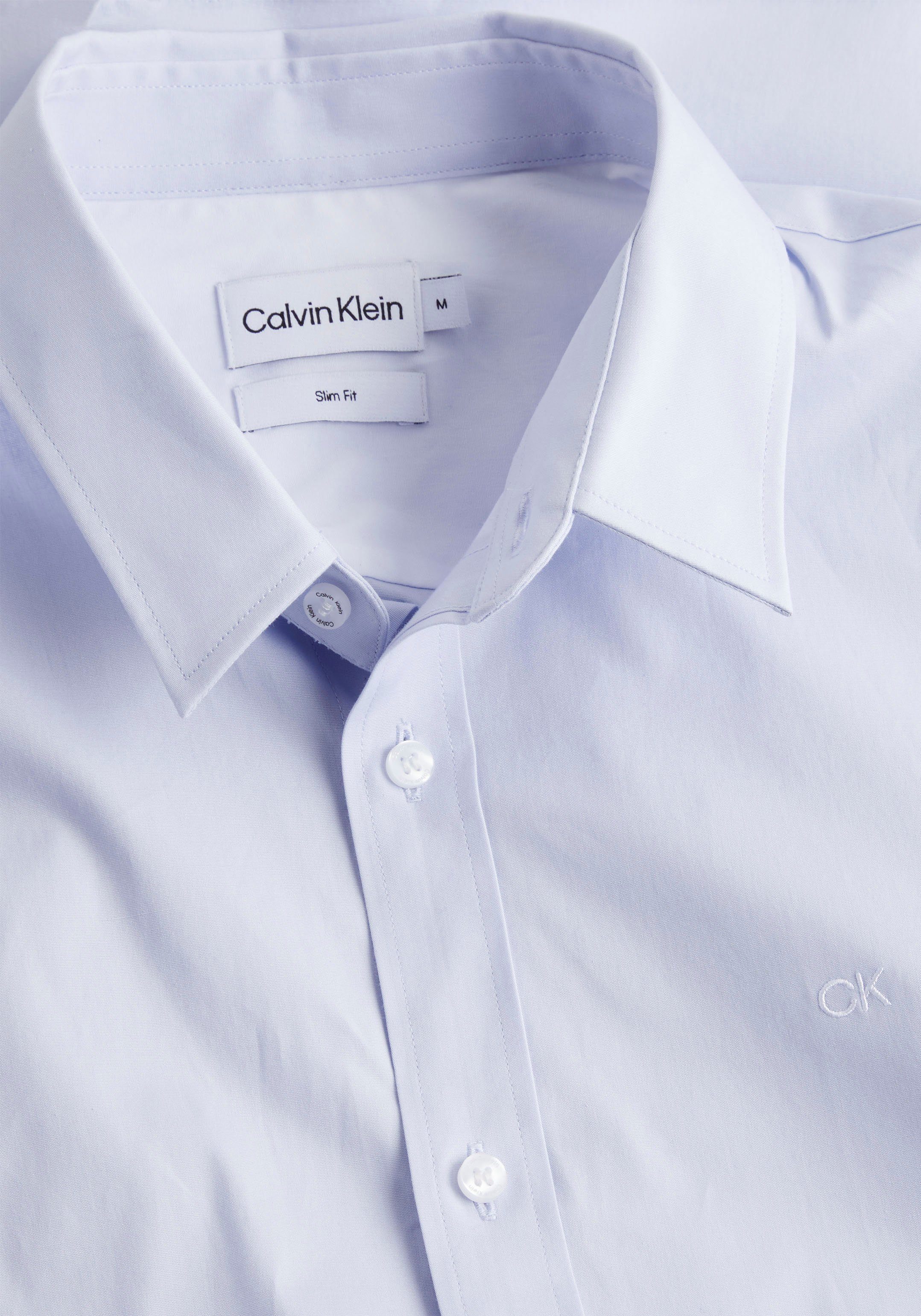 Klein mit Calvin POPLIN Klein Calvin auf light Businesshemd Brust Logo STRETCH blue SLIM SHIRT der