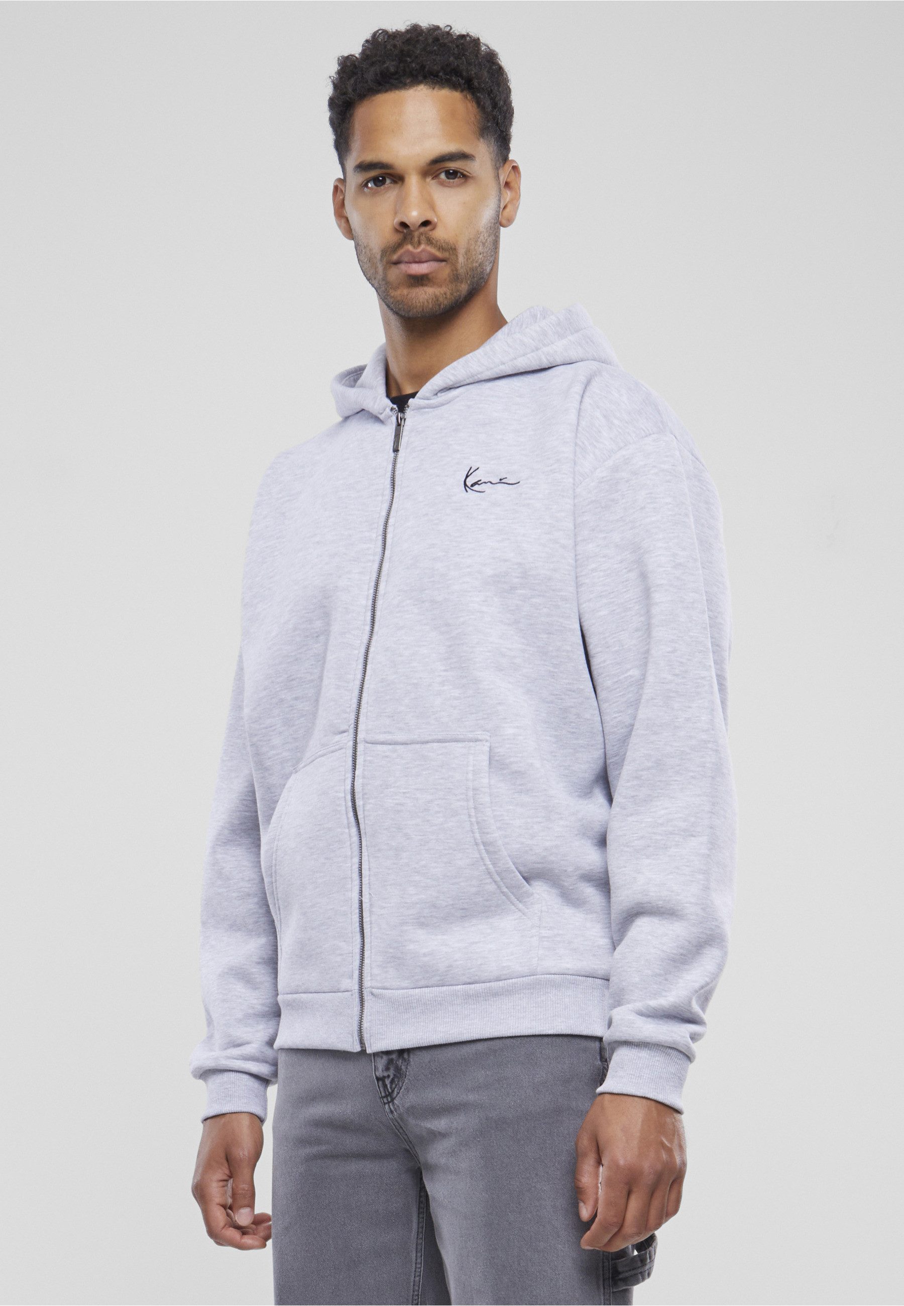 Karl Kani Outdoorjacke Karl Kani Herren Chest Signature Essential Zip Cardigan (1-St)