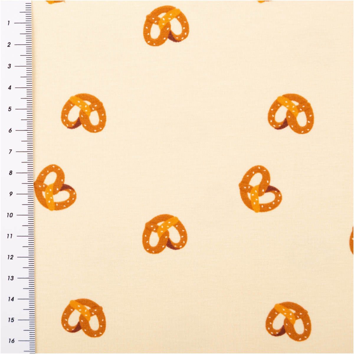 SCHÖNER LEBEN. Stoff Jersey Stoff Meterware Baumwolljersey Brezeln beige braun 150cm