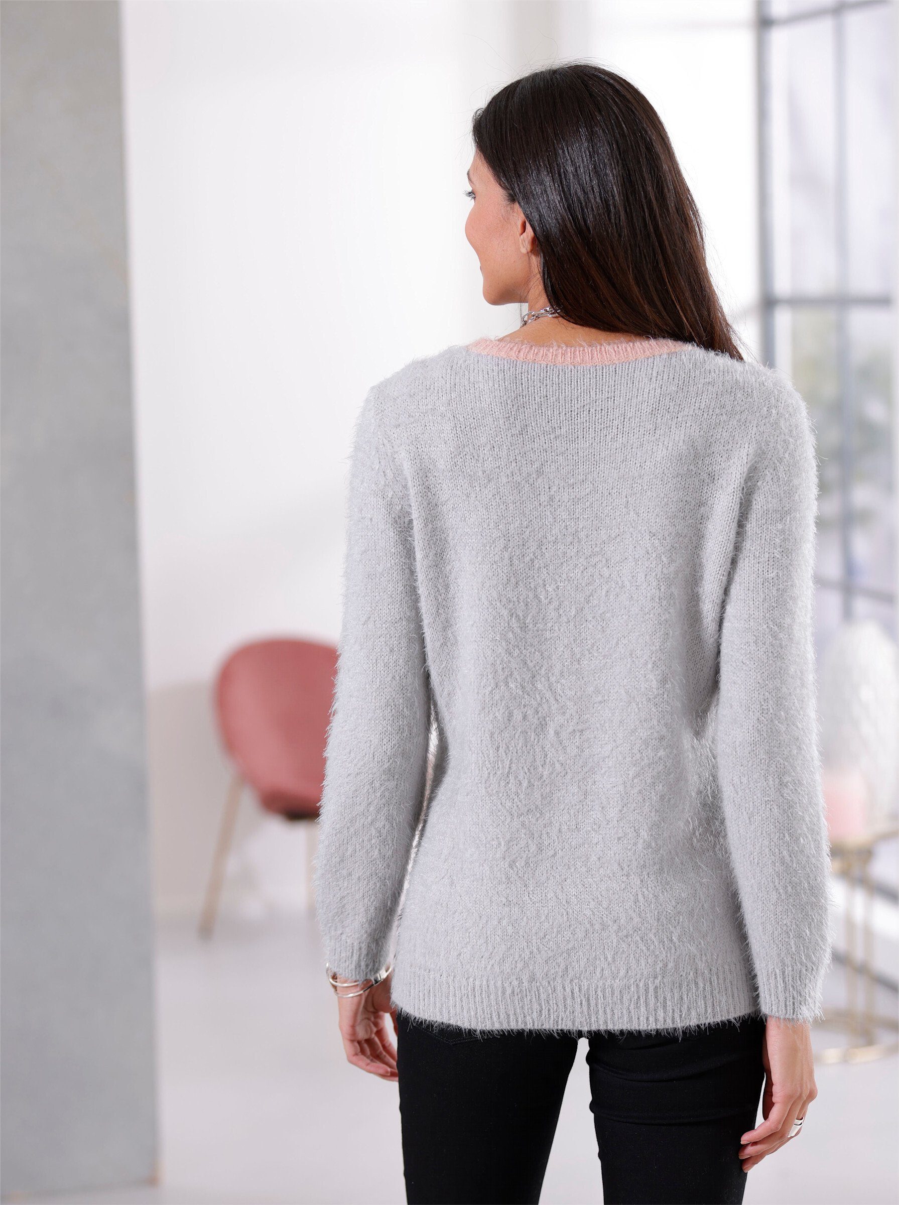 Strickpullover an! Sieh