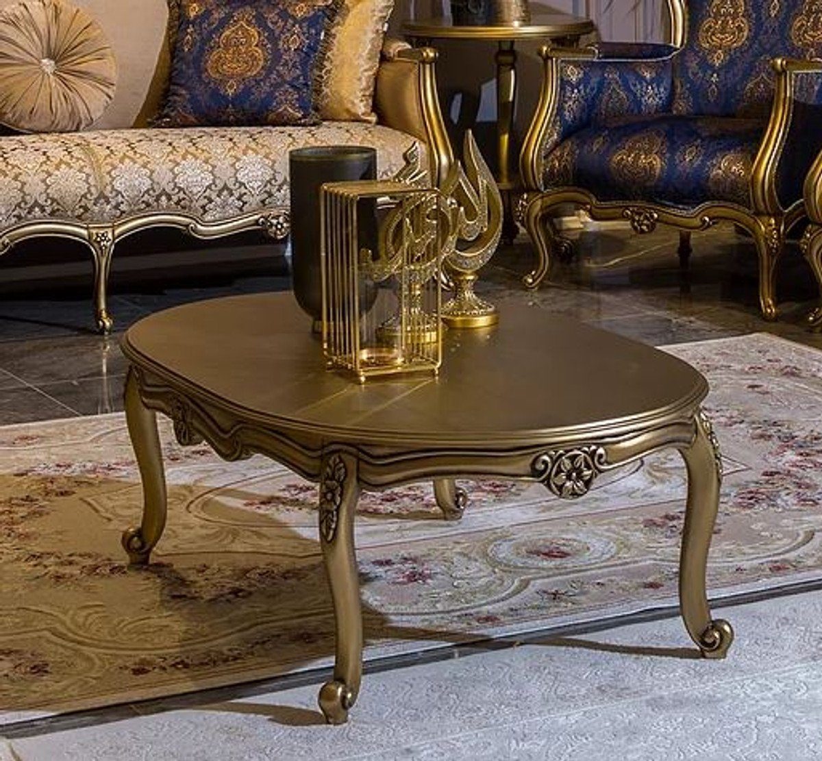 Casa Padrino Couchtisch Luxus Barock Couchtisch Gold 129 x 81 x H. 45 cm - Ovaler Massivholz Wohnzimmertisch - Barockstil Möbel