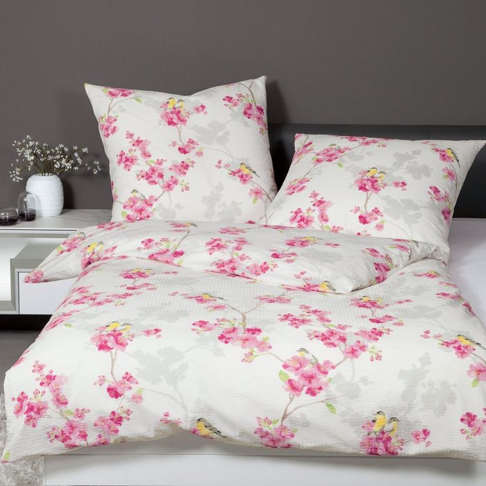 Bettwäsche Seersucker Traumschloss Seersucker 2 teilig Blumenranken mit rosa Blüte und Vögeln auf weißem Hintergrund