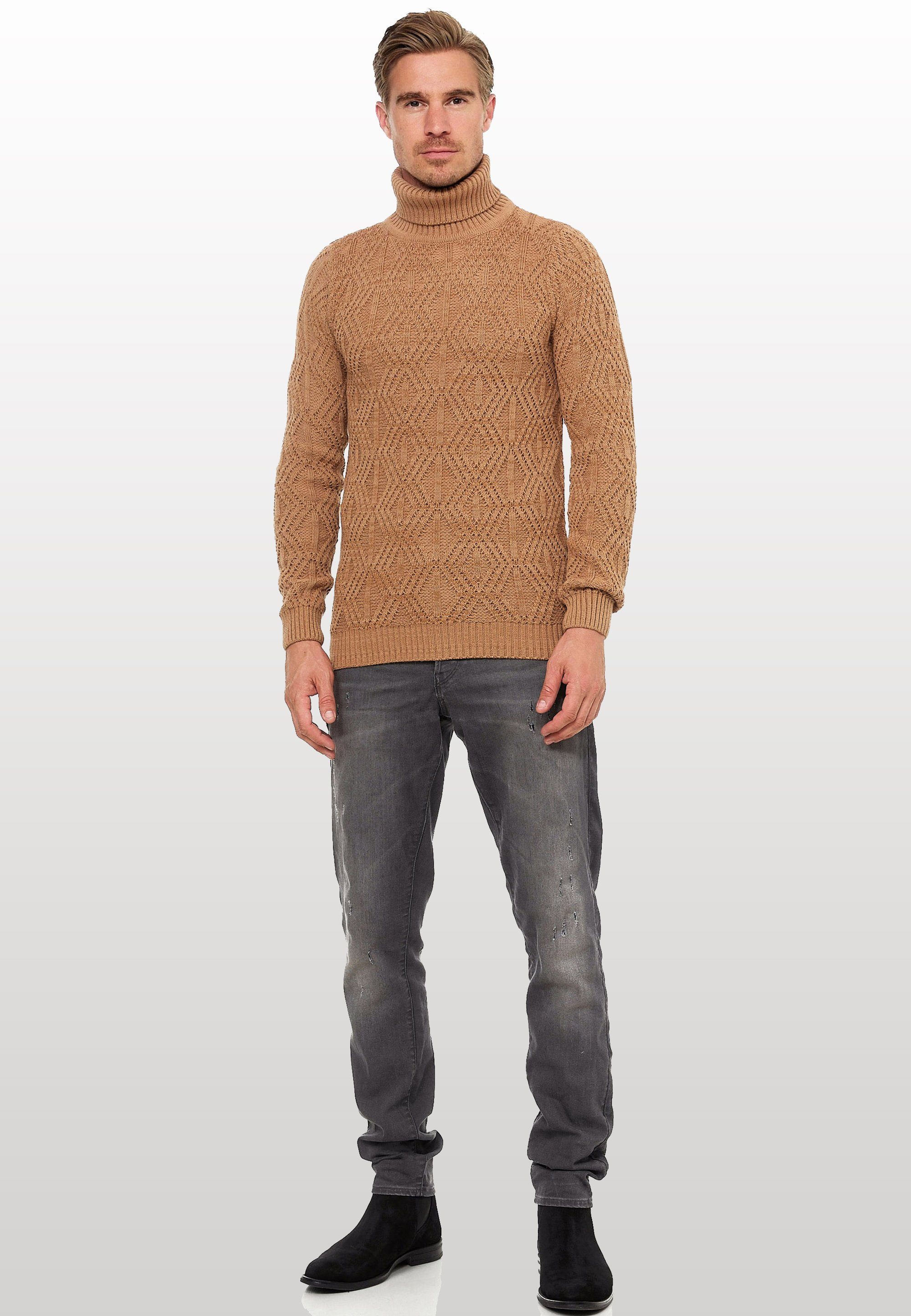 Rusty Neal Rollkragenpullover in modischem Design