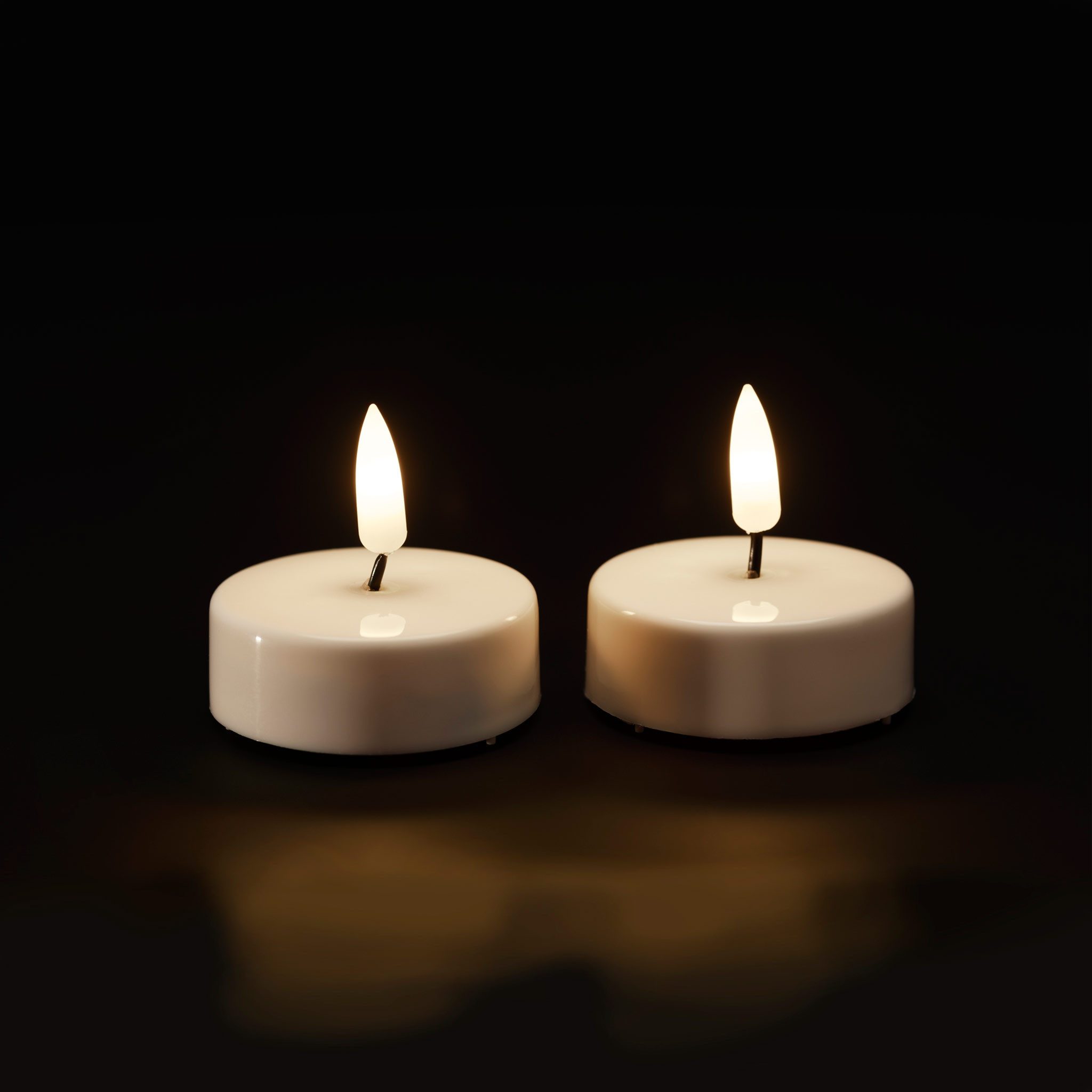 Lumineo LED-Kerze, LED Teelichter mit Timer 6x5,5cm Kunststoff Weiß / Warmw günstig online kaufen