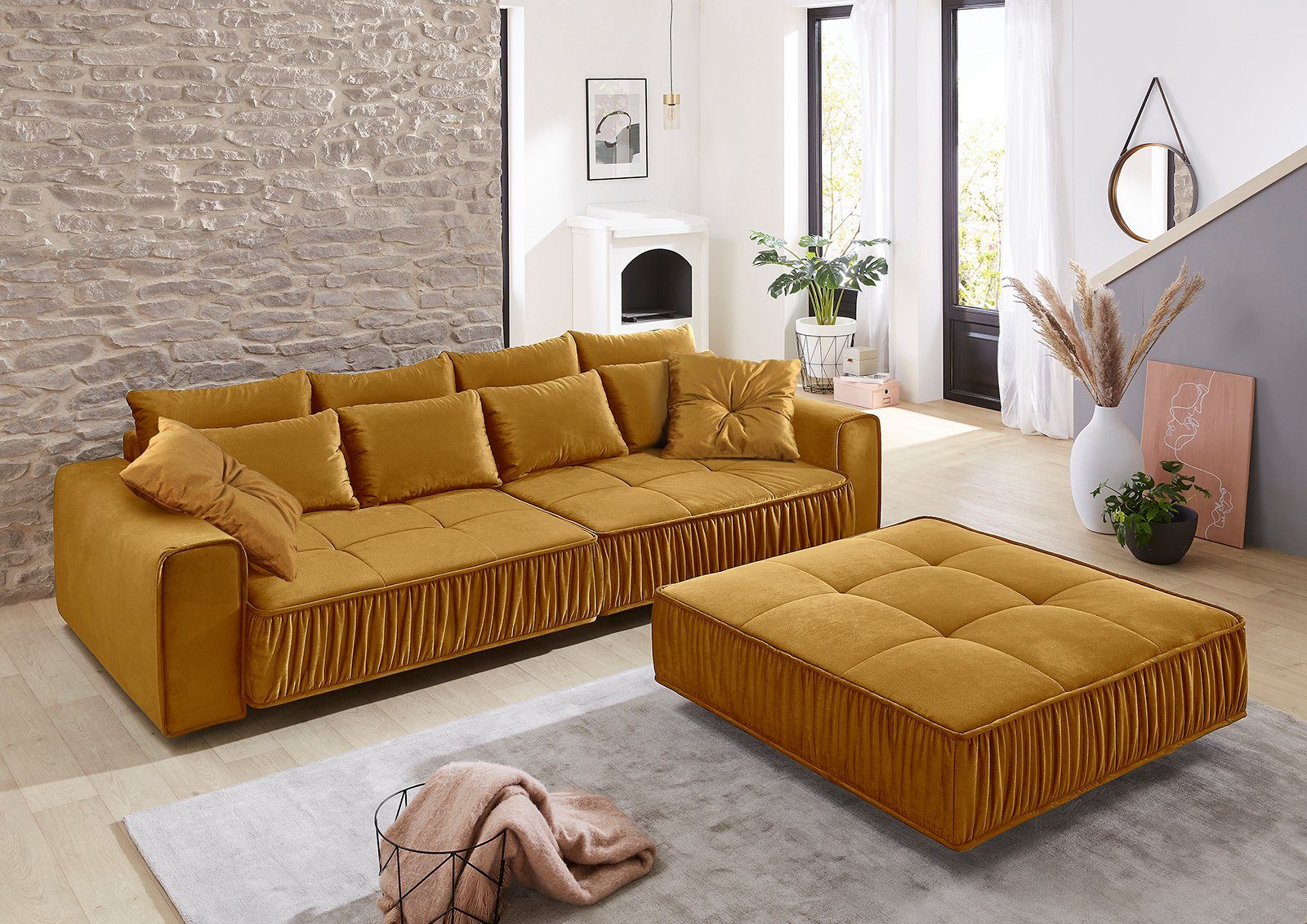 Places of Style Big-Sofa, mit schwebender Optik und künstlerischer Raffung an der vorderen Kante, Federkernpolsterung, frei im Raum stellbar-kaufen
