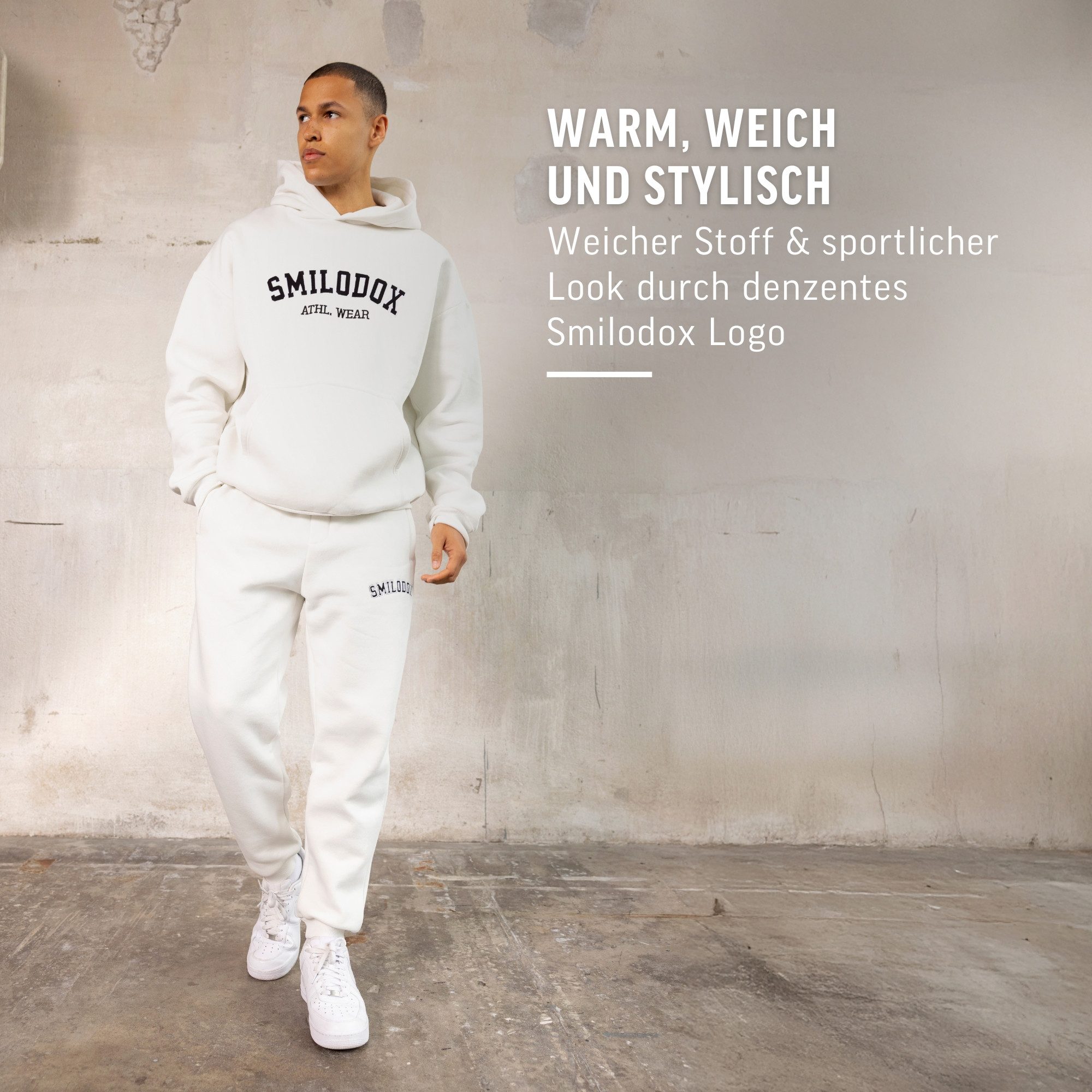 Smilodox Jogginghose Kayson, Oversize Freizeithose mit Reißverschlusstaschen, Tunnelzug weiches flauschiges Material Logo Sweathose Sport Alltag
