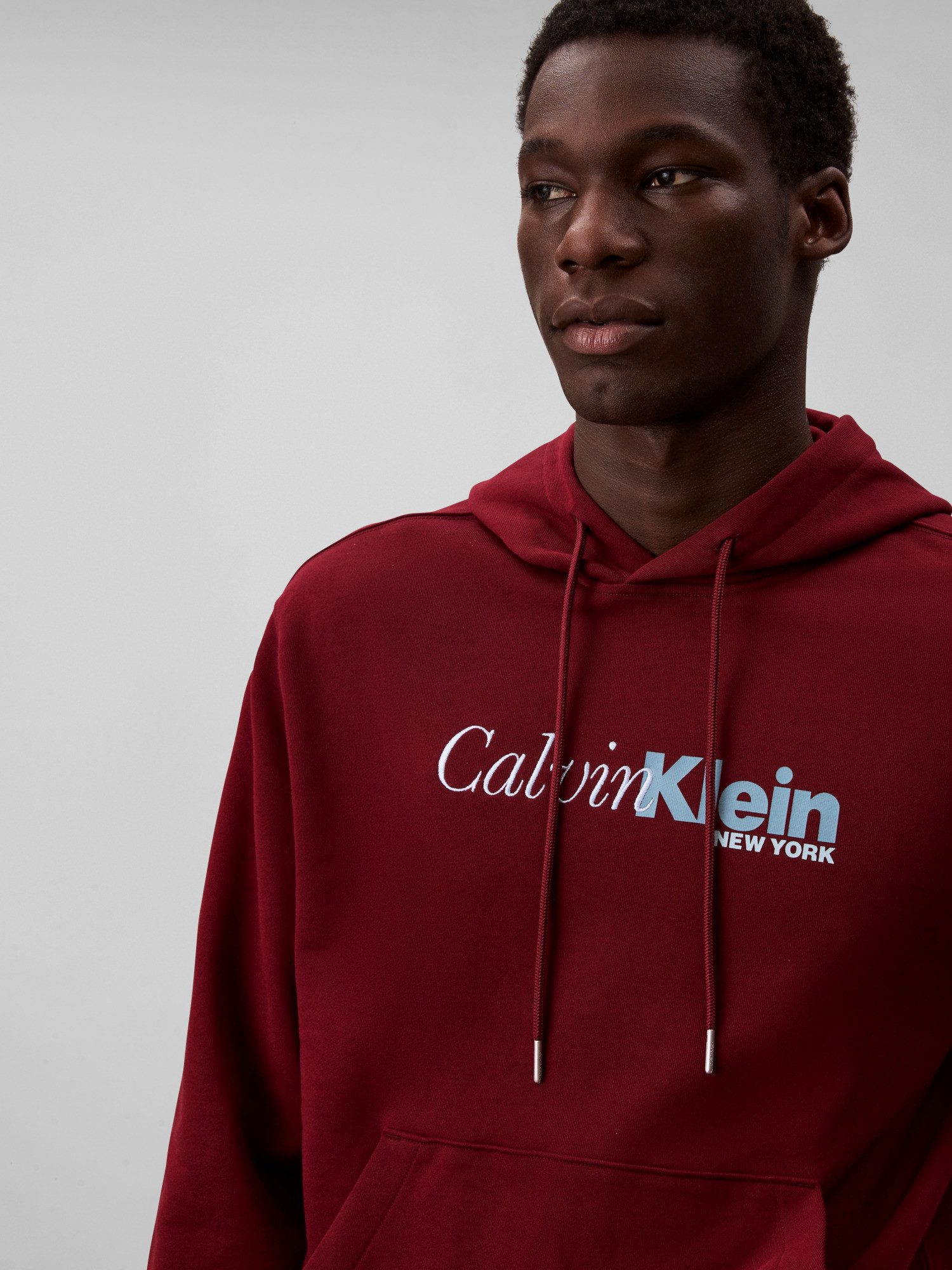 Calvin Klein Kapuzensweatshirt LS EU 350TERRY CURSIVE GRAPHIC H regular fit, Logo-Schriftzug