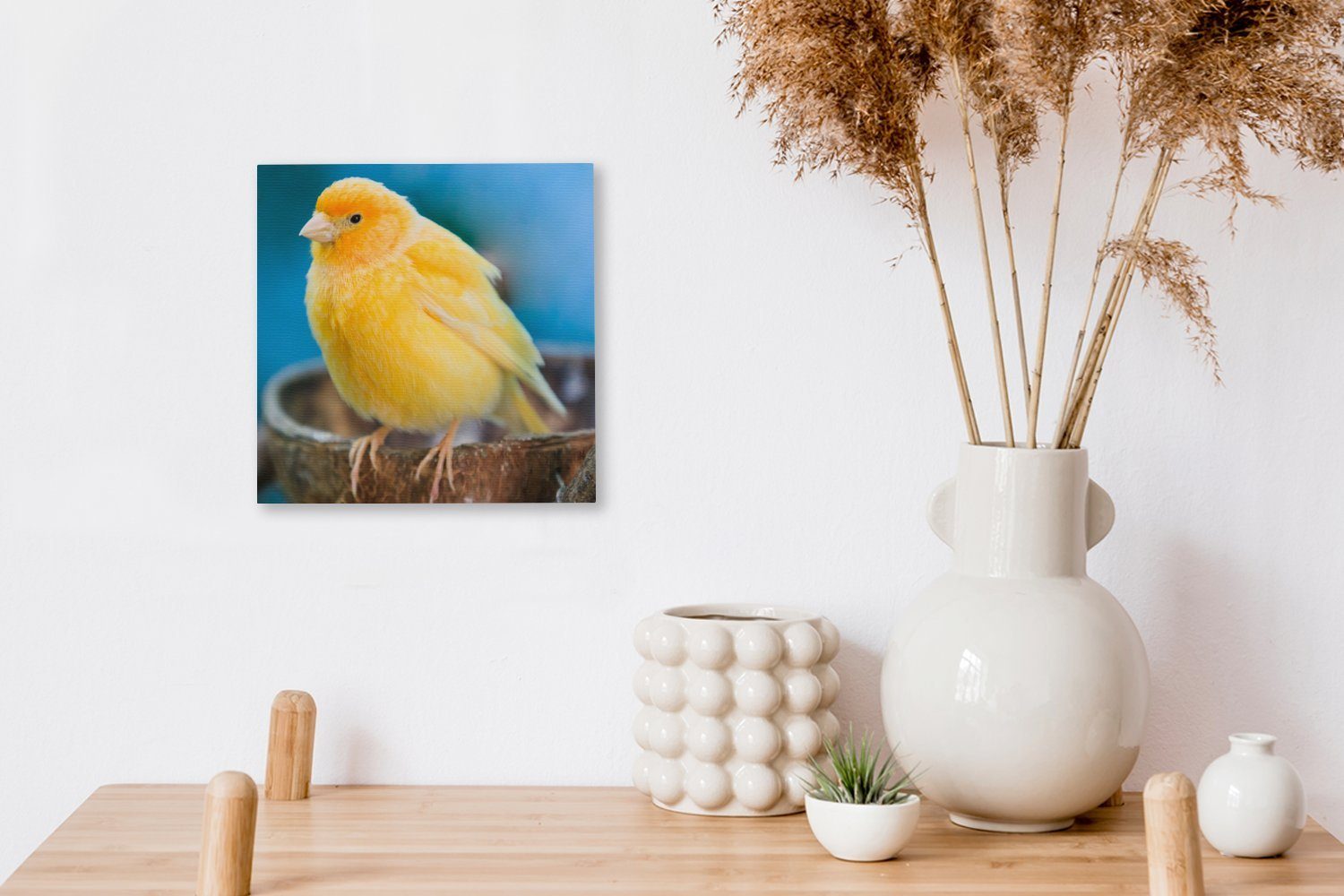 OneMillionCanvasses® Leinwandbild Leuchtend europäischer gelber Leinwand (1 Schlafzimmer Wohnzimmer seinem sitzt, Nest bei Kanarienvogel, Bilder für St), der