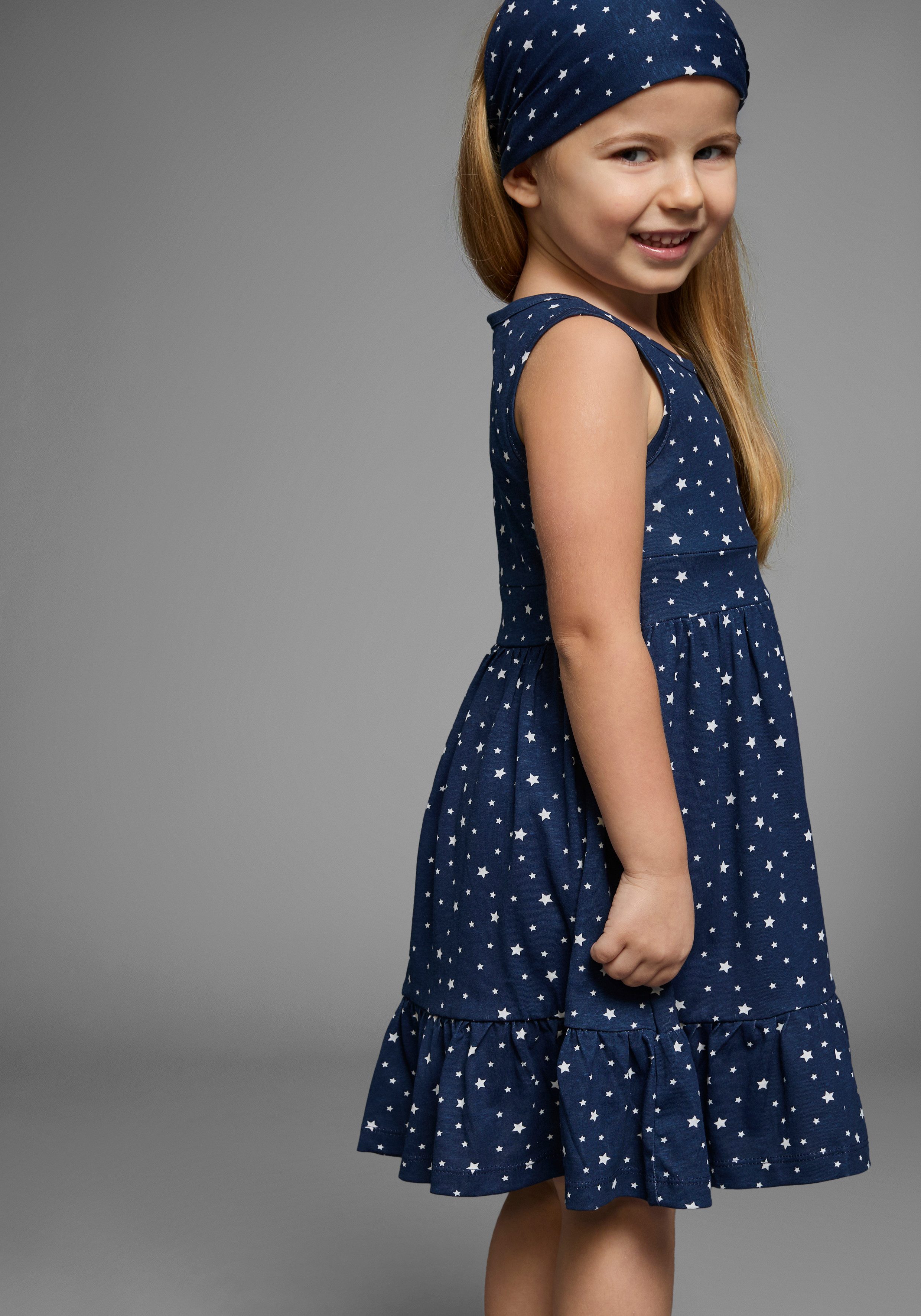 KIDSWORLD Jerseykleid 2tlg. Shirtkleid + Haarband im niedlichen Sternen-Allover (Set, 2-tlg., 2) festliche Anlässe, knielang, verspielter Stil, aus Baumwolle