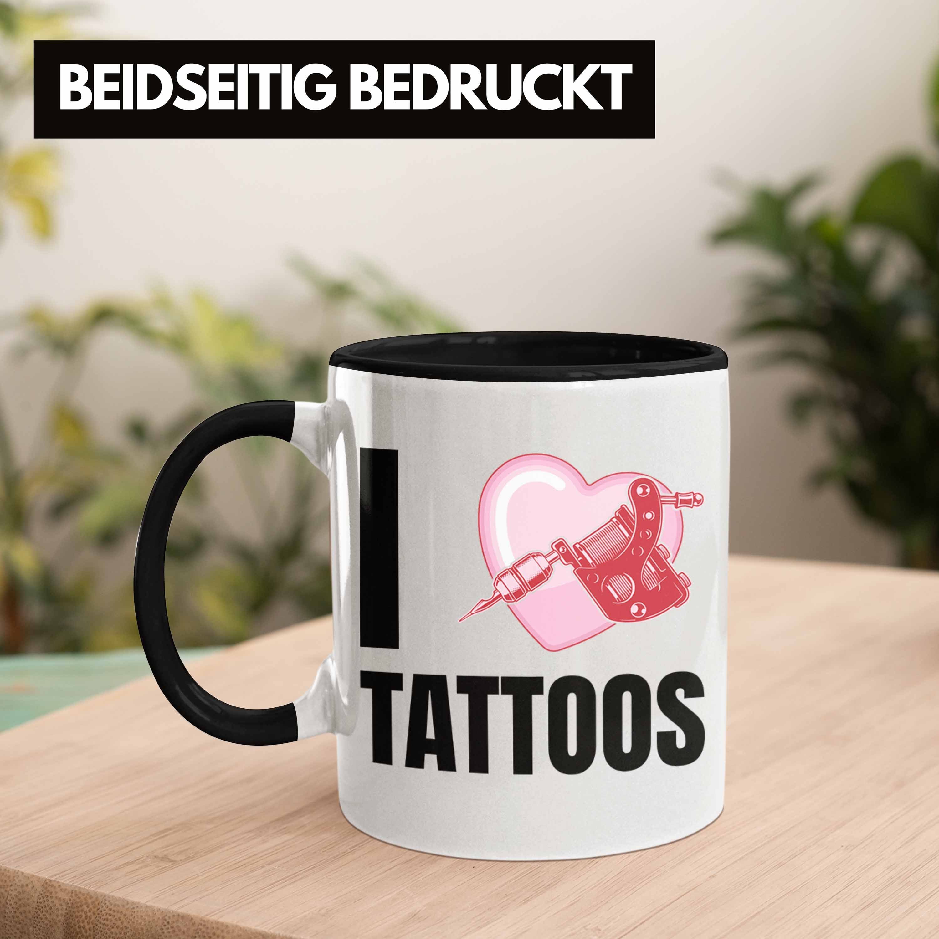 Trendation Tasse Trendation - I Geschenkidee Schwarz Tattoowiererin Spruch Tattoos Love Tattoowierer Frauen Geschenk Männer Tasse