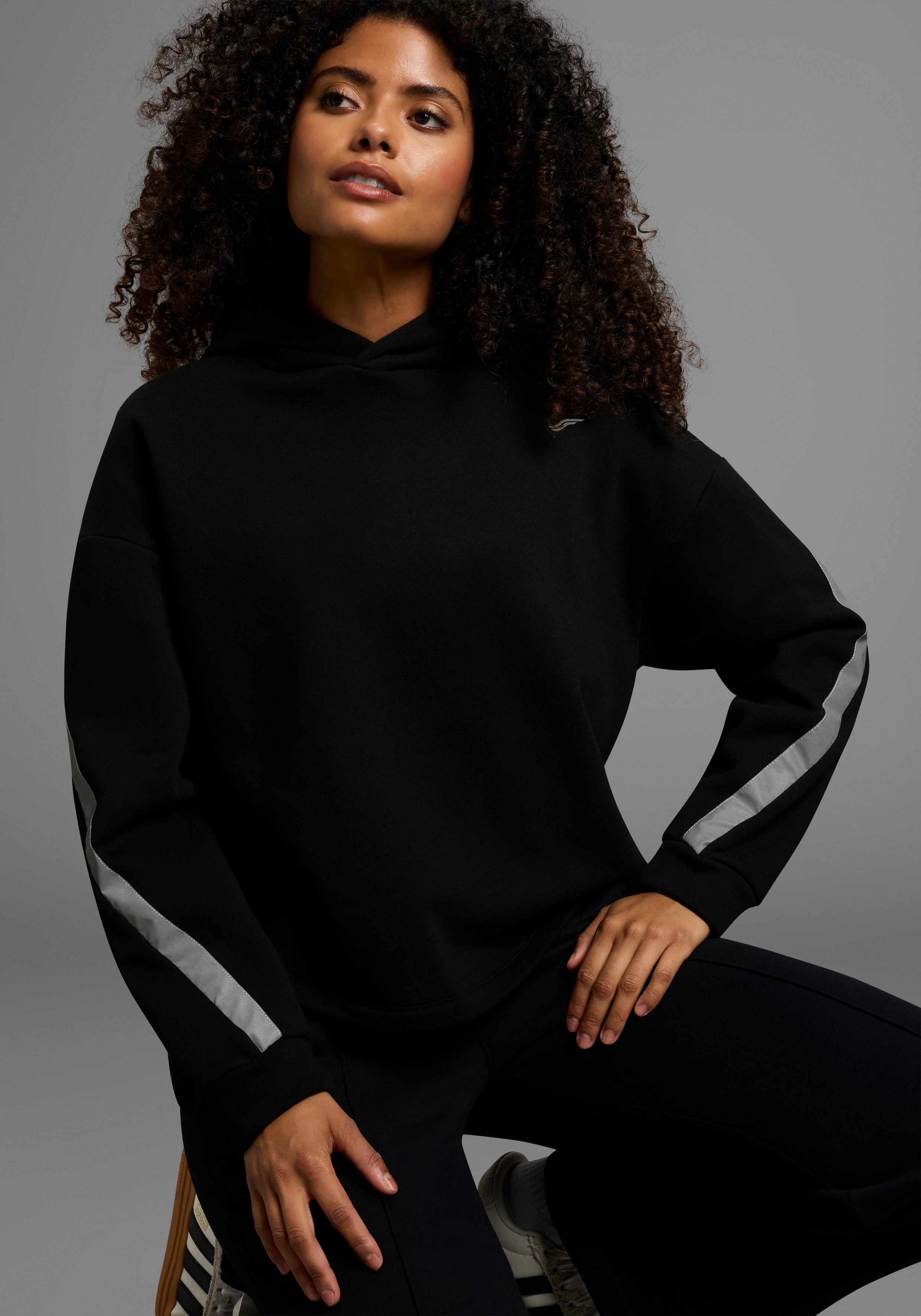 FAYN SPORTS Kapuzensweatshirt Weiches oversized Sweatshirt mit Reflektorstr günstig online kaufen