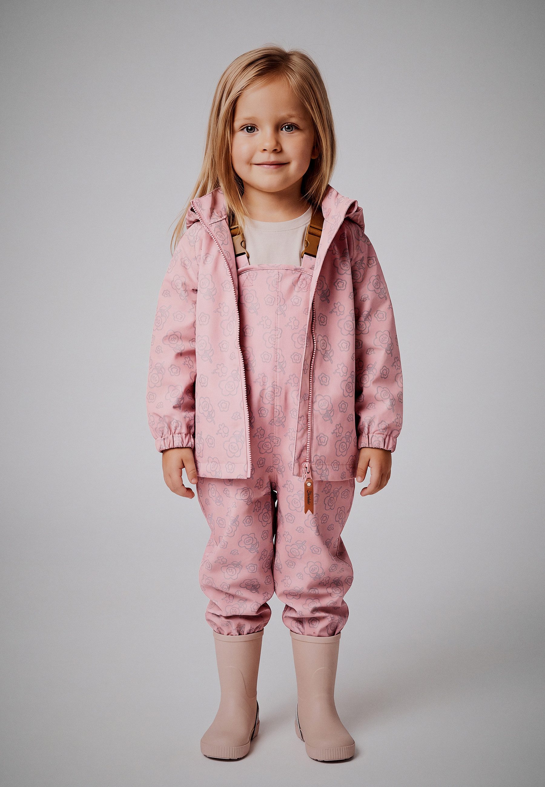 Sterntaler® Regenjacke Regenjacke gefüttert Blume (1-St) Gefütterte, wasserabweisende Regenjacke mit Reflexdruck