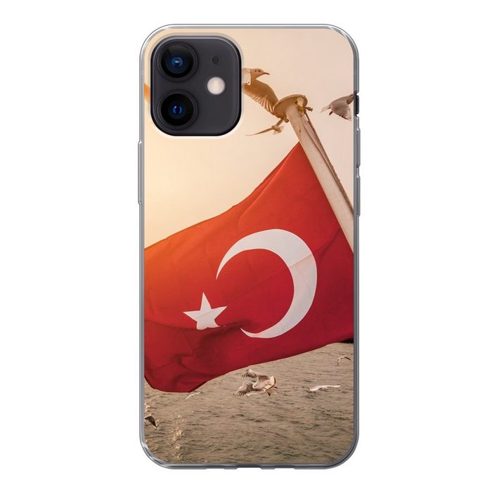 MuchoWow Handyhülle Eine türkische Flagge auf einem Schiff Handyhülle Apple iPhone 12 Smartphone-Bumper Print Handy