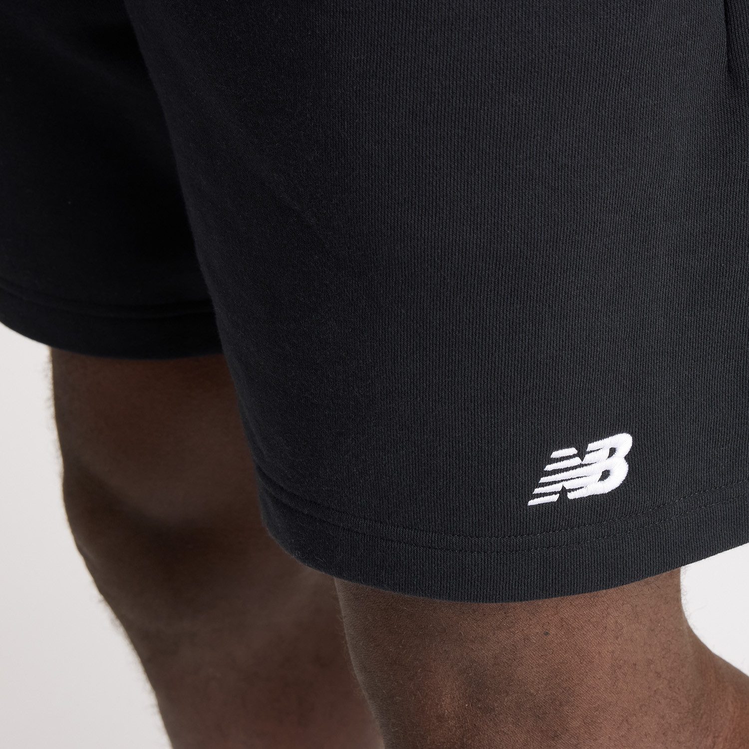 New Balance Sweatshorts Sport Essentials French Terry Short 7" mit Eingrifftaschen und Gesäßtasche, aus weichem French-Terry-Material