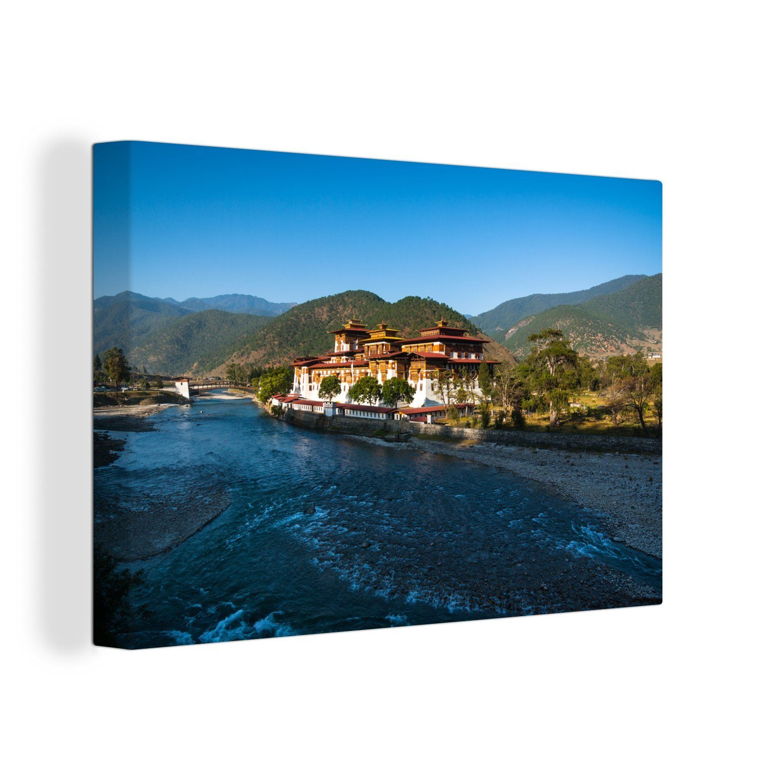 OneMillionCanvasses® Leinwandbild Punakha Dzong an einem breiten, flachen Fluss in Bhutan, (1 St), Wandbild Leinwandbilder, Aufhängefertig, Wanddeko, 30x20 cm