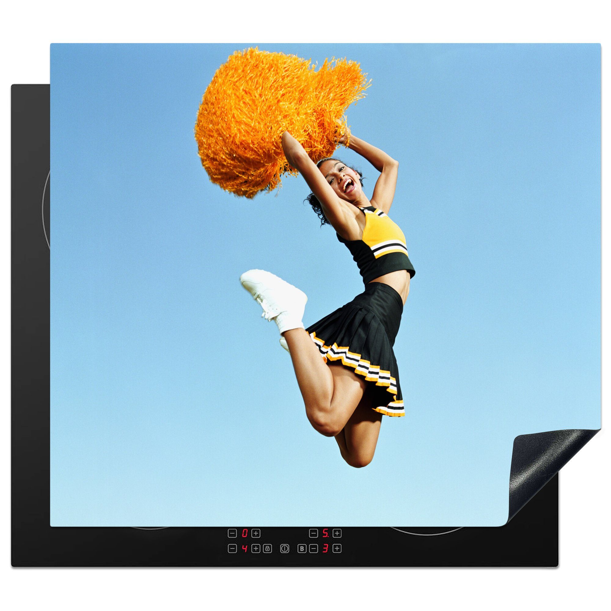 MuchoWow Herdblende-/Abdeckplatte Ein Cheerleader in die (1 Pompons Luft, Vinyl, springt mit Ceranfeldabdeckung Induktionsmatte küche, die cm, für tlg), 59x52 orangefarbenen