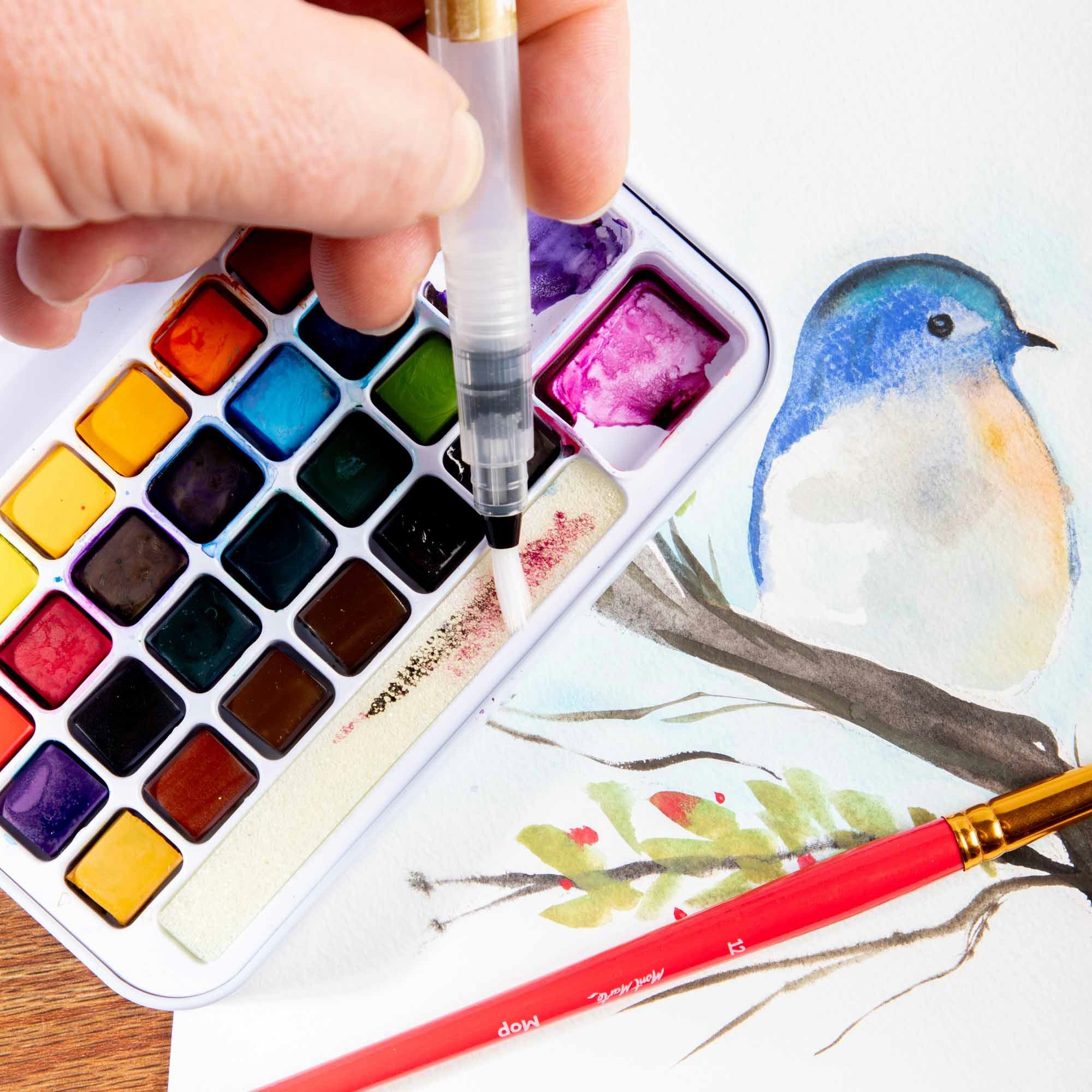 Mont Marte Aquarellfarbe Set 24 / 36 Farben – Malset mit Wassertankpinsel, Etui mit Fingerring, Ideal für Reisen, Urban Sketching & kreative Auszeiten