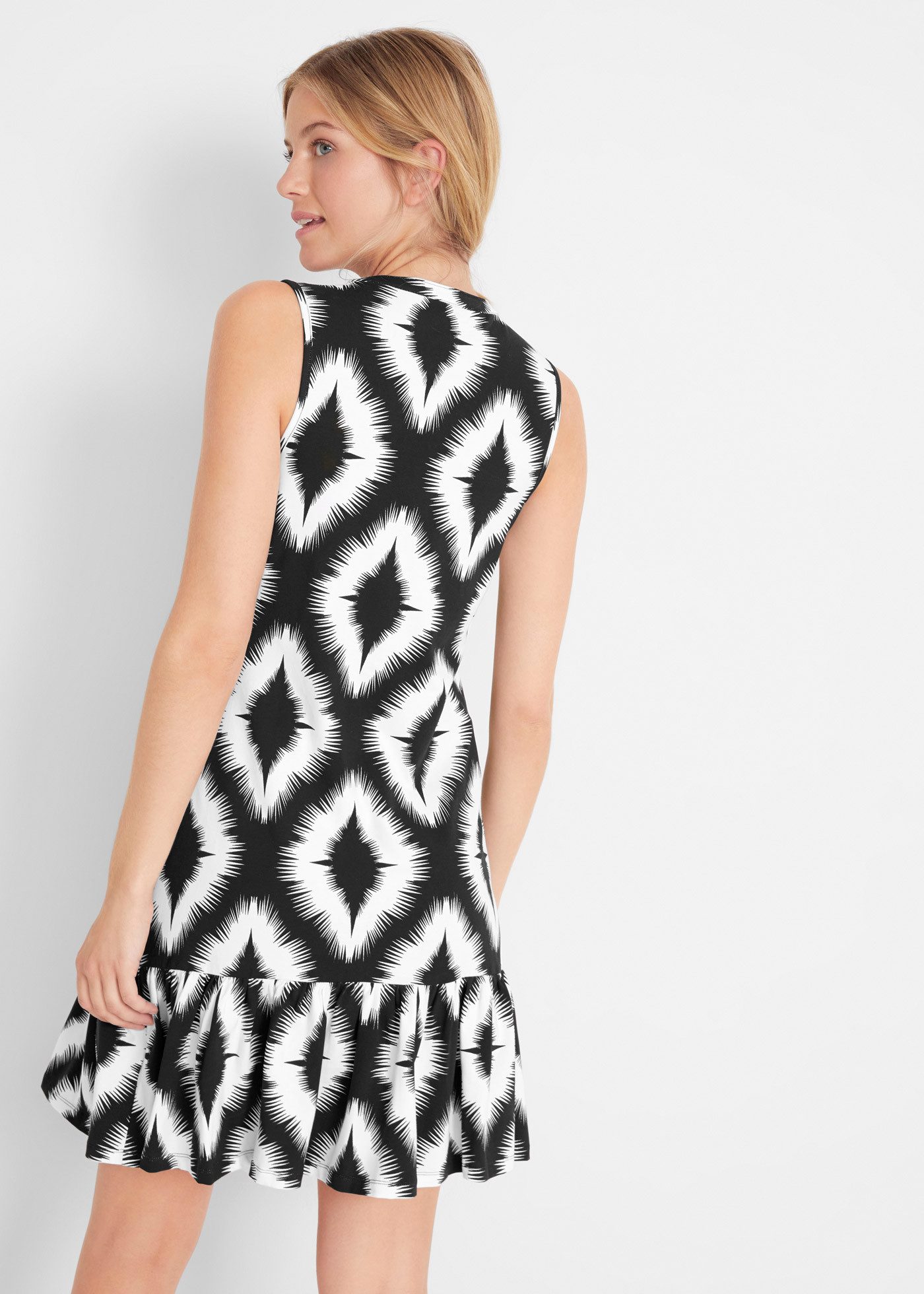 bonprix Jerseykleid mit Alloverprint und Volant am Saum günstig online kaufen