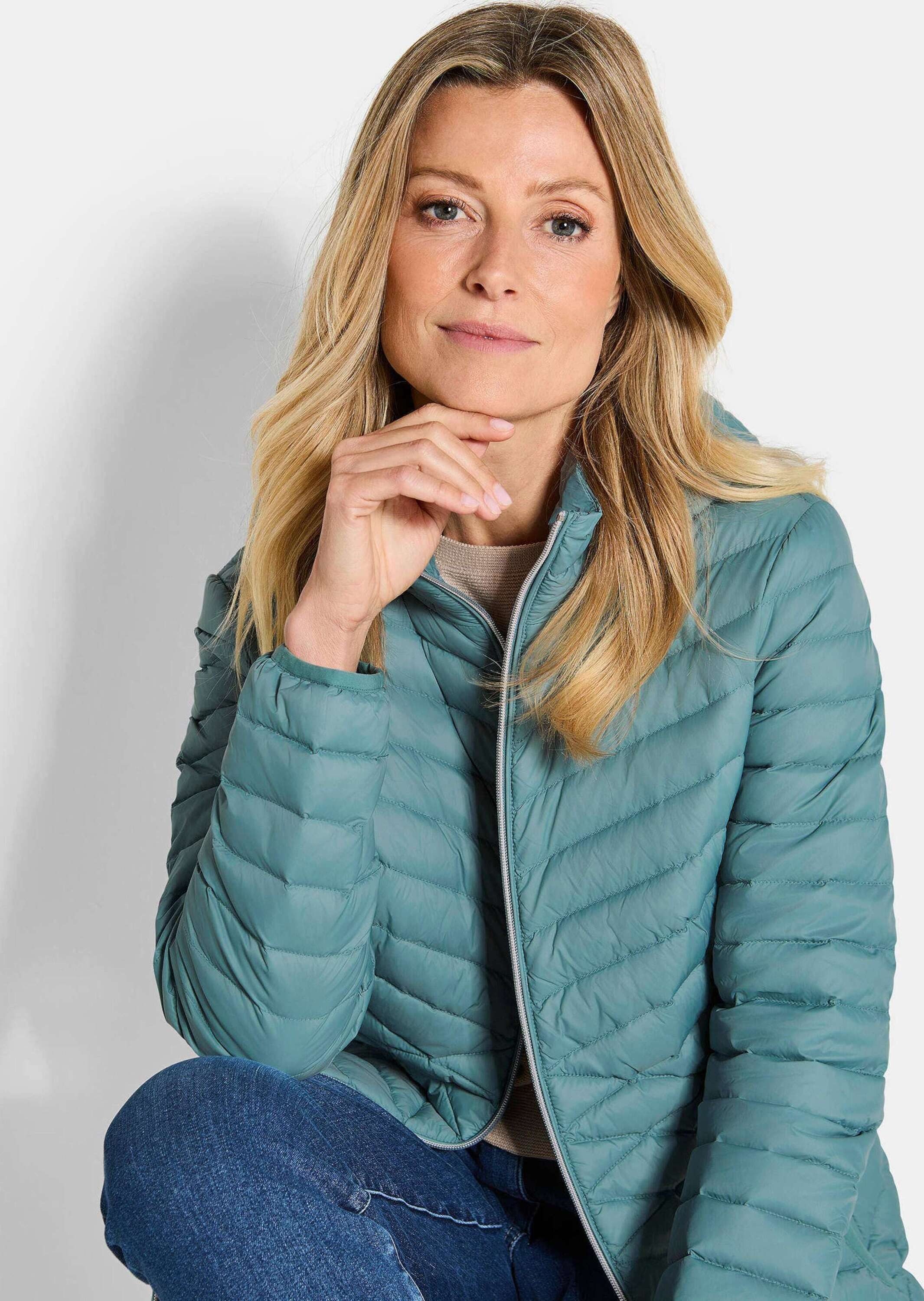 GOLDNER Winterjacke Gefütterter langer Mantel mit Kapuze Wintermantel in femininer Steppung mit Stehkragen und Taschen