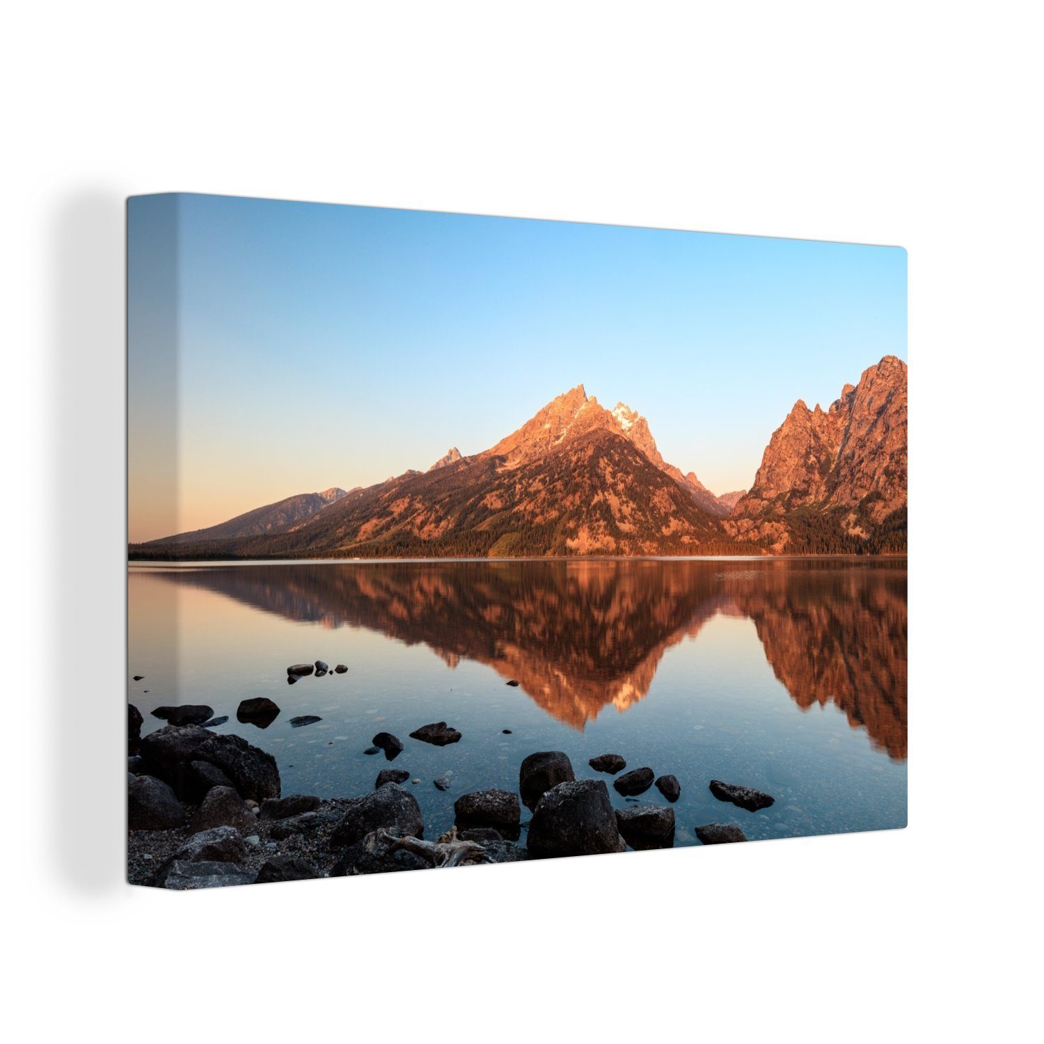 Mountains Leinwandbilder, Morgenlicht cm Wandbild St), Leinwandbild in (1 eines am Aufhängefertig, 30x20 Sees, Rande Teton den ruhigen OneMillionCanvasses® Wanddeko,