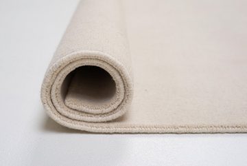 Wollteppich Holi, THEKO, rechteckig, Höhe: 13 mm, Uni-Farben, leicht meliert, reine Wolle, handgewebt mit Knüpfoptik