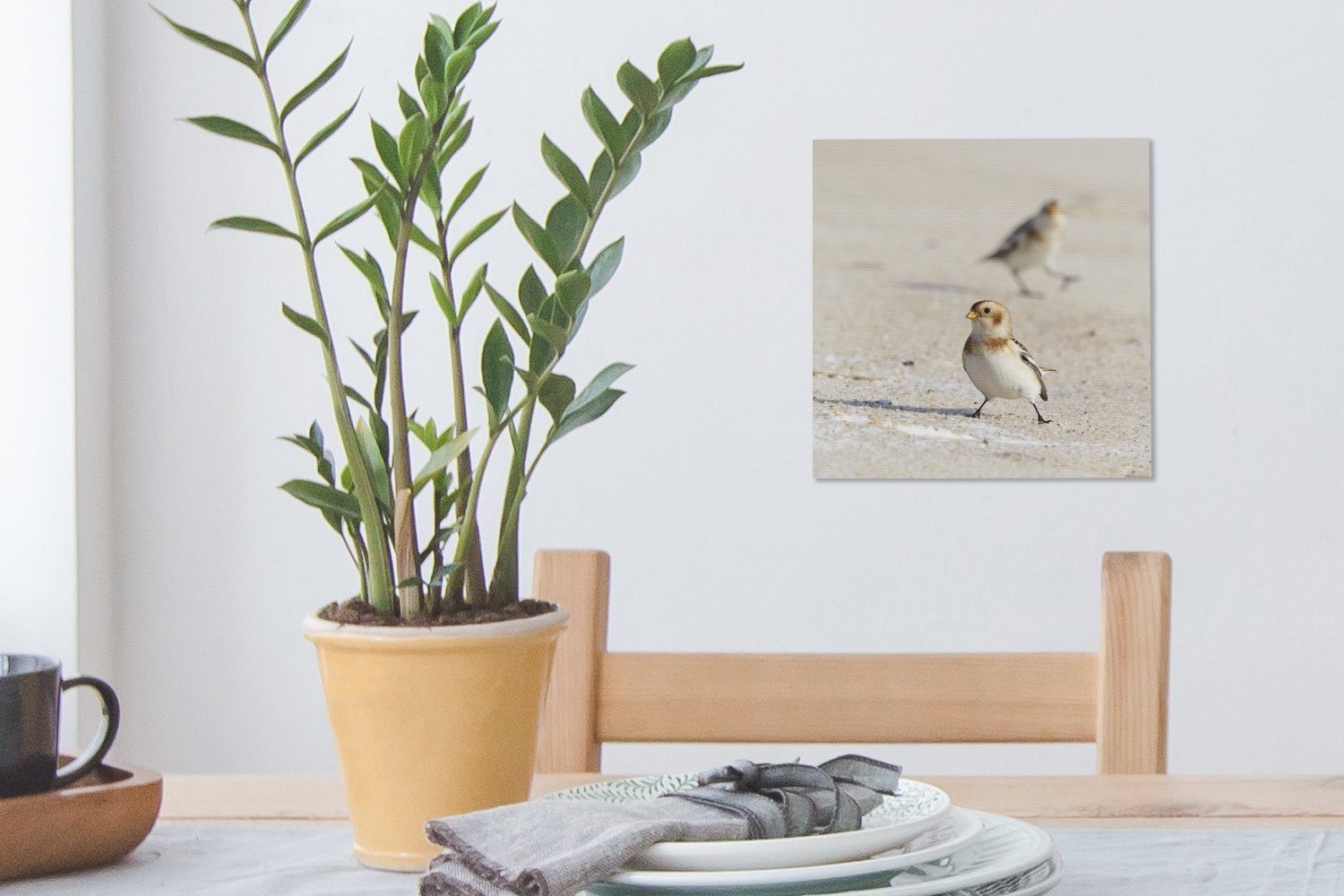 im Ein Sanderling Bilder Schnee, (1 Leinwand Leinwandbild St), Wohnzimmer Sand für kleiner mit von Schlafzimmer Resten OneMillionCanvasses®