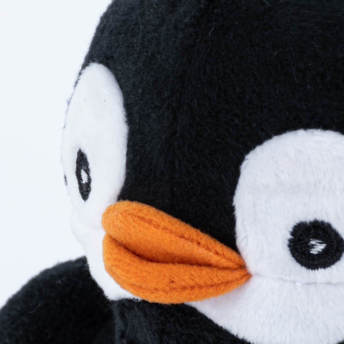 Habibi Plush Wärmekissen Wärmetier Pinguin schwarz weiß orange mit Hirse Füllung Habibi Plush