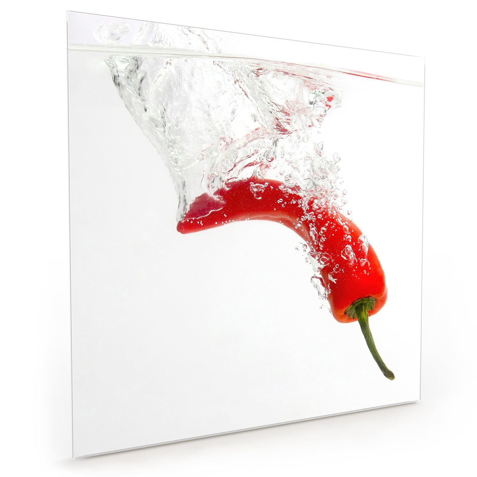 Primedeco Küchenrückwand Küchenrückwand Spritzschutz Glas mit Motiv Chili fällt in Wasser
