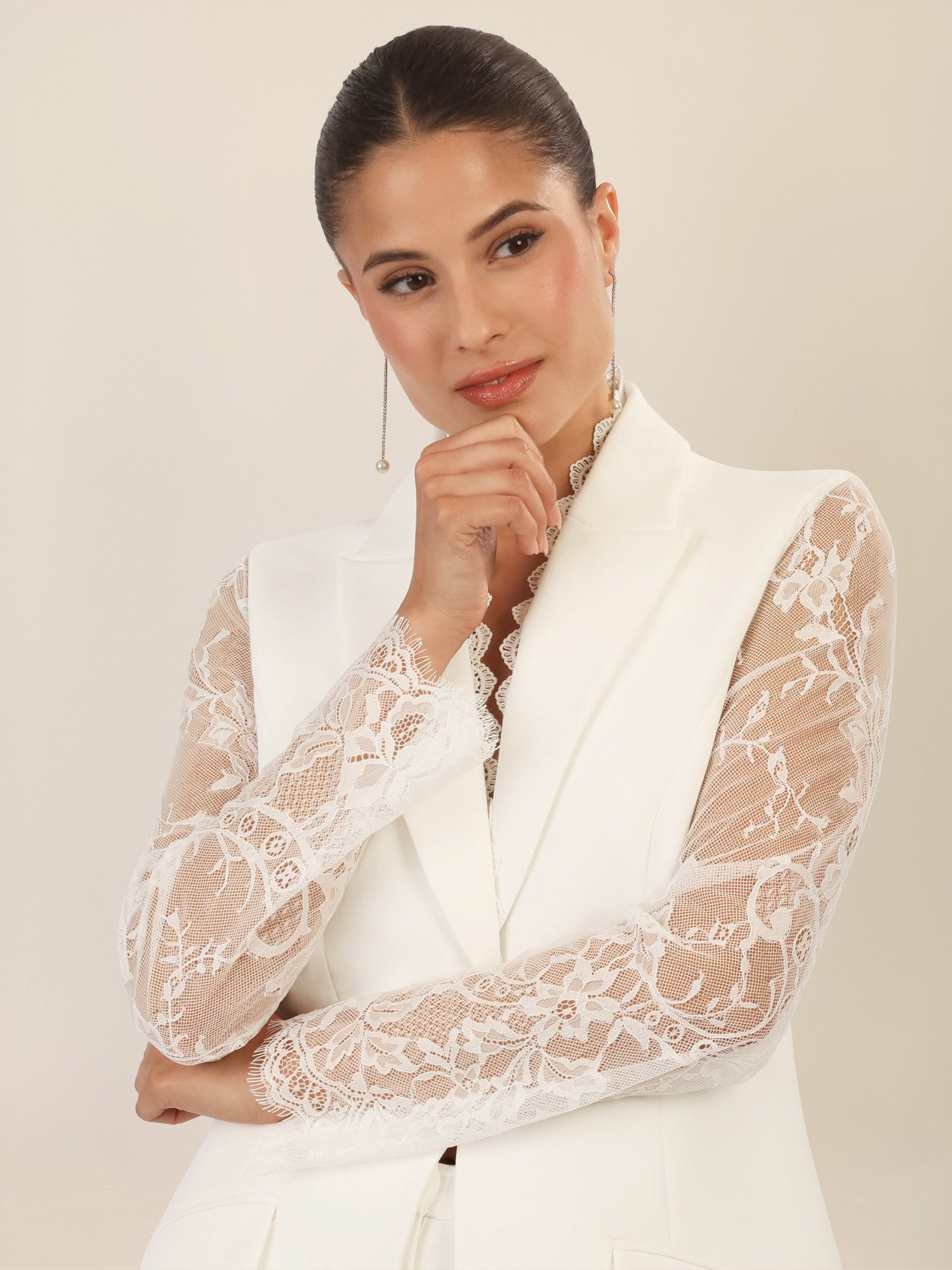 Apart pantsuit with lace details and decorative edge