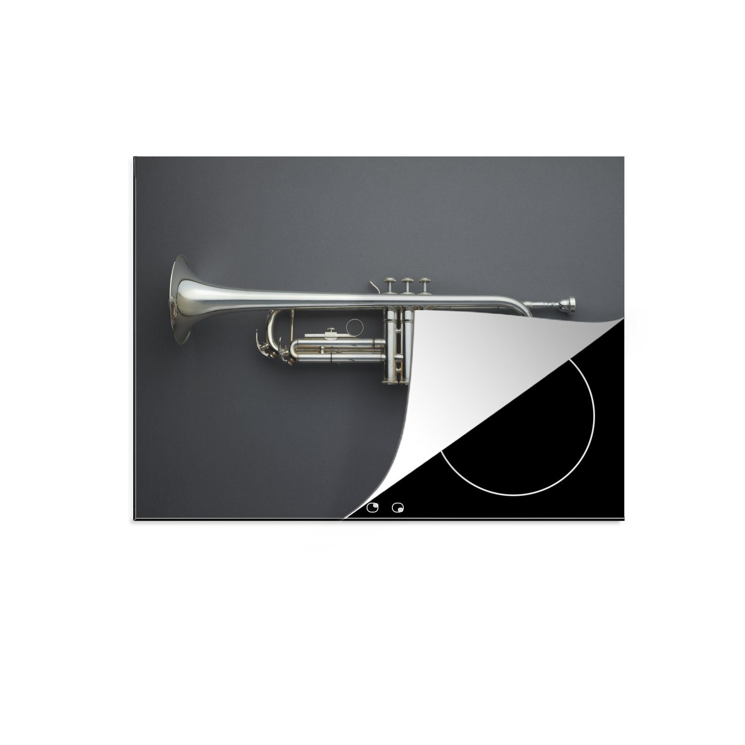 MuchoWow Herdblende-/Abdeckplatte Eine silberne Trompete auf einem grauen Boden, Vinyl, (1 tlg), 71x52 cm, Induktionskochfeld Schutz für die küche, Ceranfeldabdeckung