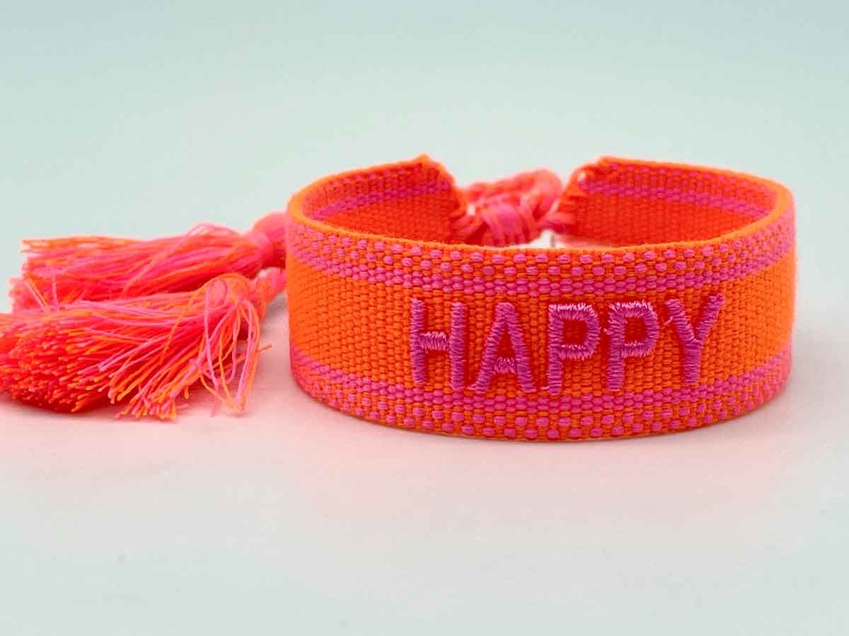 LS-LebenStil Armband Canvas Statement Armband Happy Neon Orange Pink Quasten bestickt (Baumwollarmband Webarmband Armbandliebe Freundschaftsarmband Freundschaftsband Partnerarmband, 1-tlg., textil geflochten gewebt - hochwertiger gestickter Spruch), perfekt als Serviettenring – personalisiert auch für Hochzeiten usw