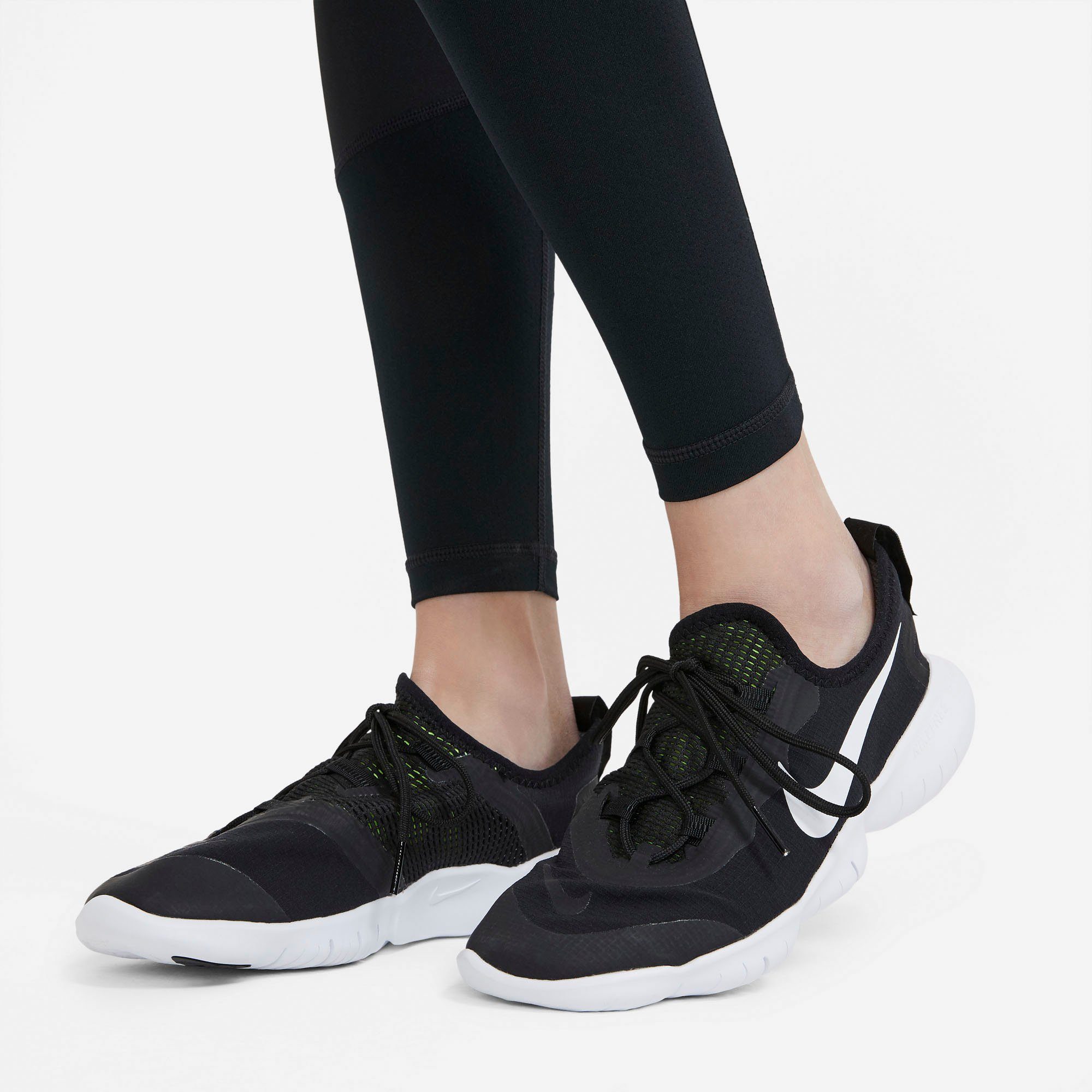 Nike Leggings G NP LEGGING mit Logodruck und Logoschriftzügen, besonders elastische Passform