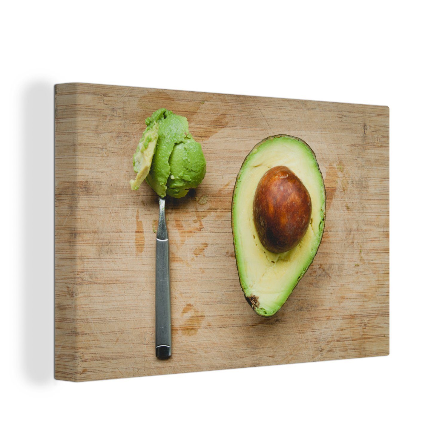 OneMillionCanvasses® Leinwandbild Avocado auf einem Schneidebrett mit einem Löffel, (1 St), Wandbild Leinwandbilder, Aufhängefertig, Wanddeko, 30x20 cm