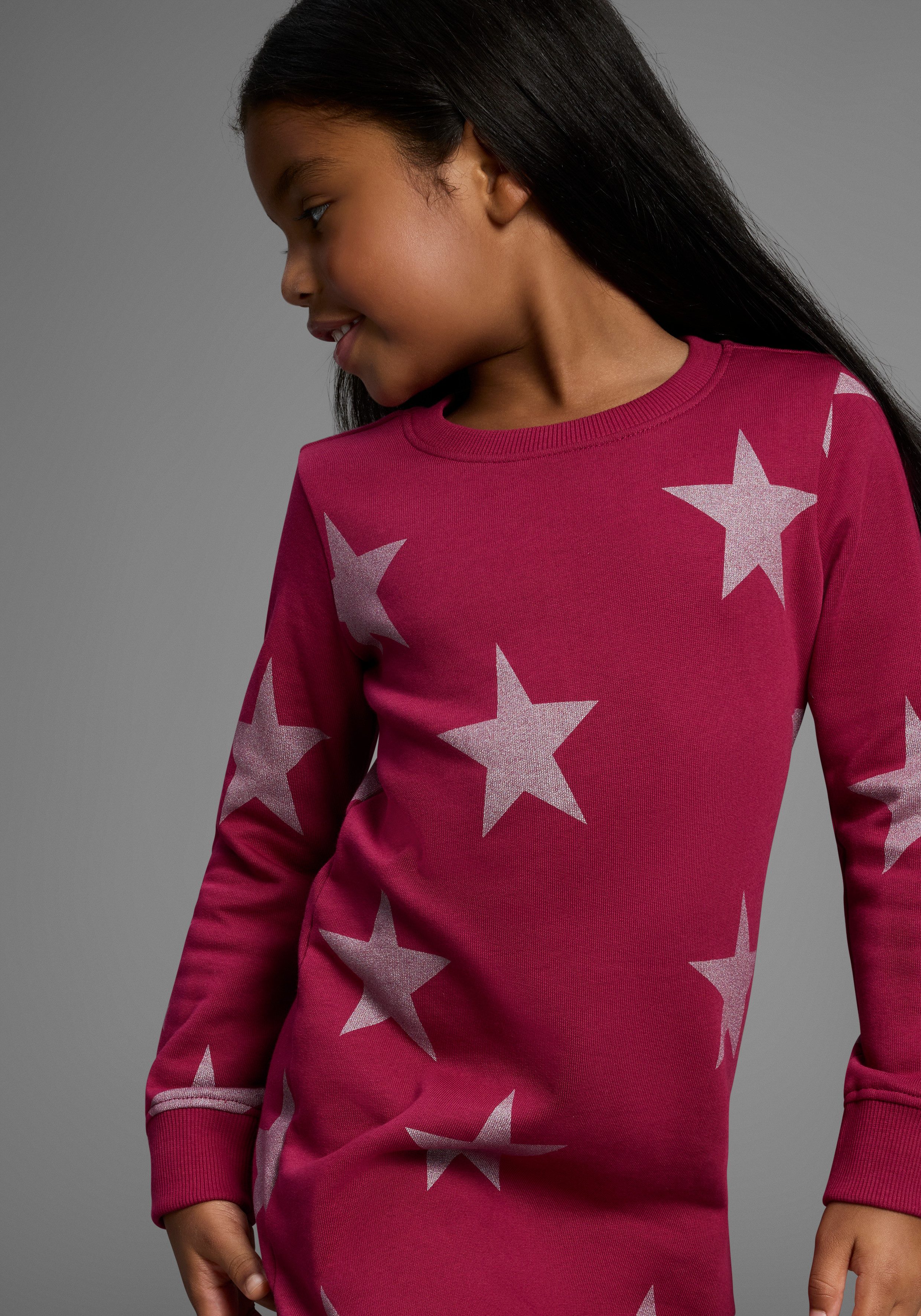KIDSWORLD Sweatkleid Sterne-Allover Kleid für kleine Mädchen Sweatkleid mit Glitzerdruck