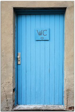 Wallario Sichtschutzzaunmatten Blaue Tür einer Toilette in einer verlassenen Fabrik in Magdeburg