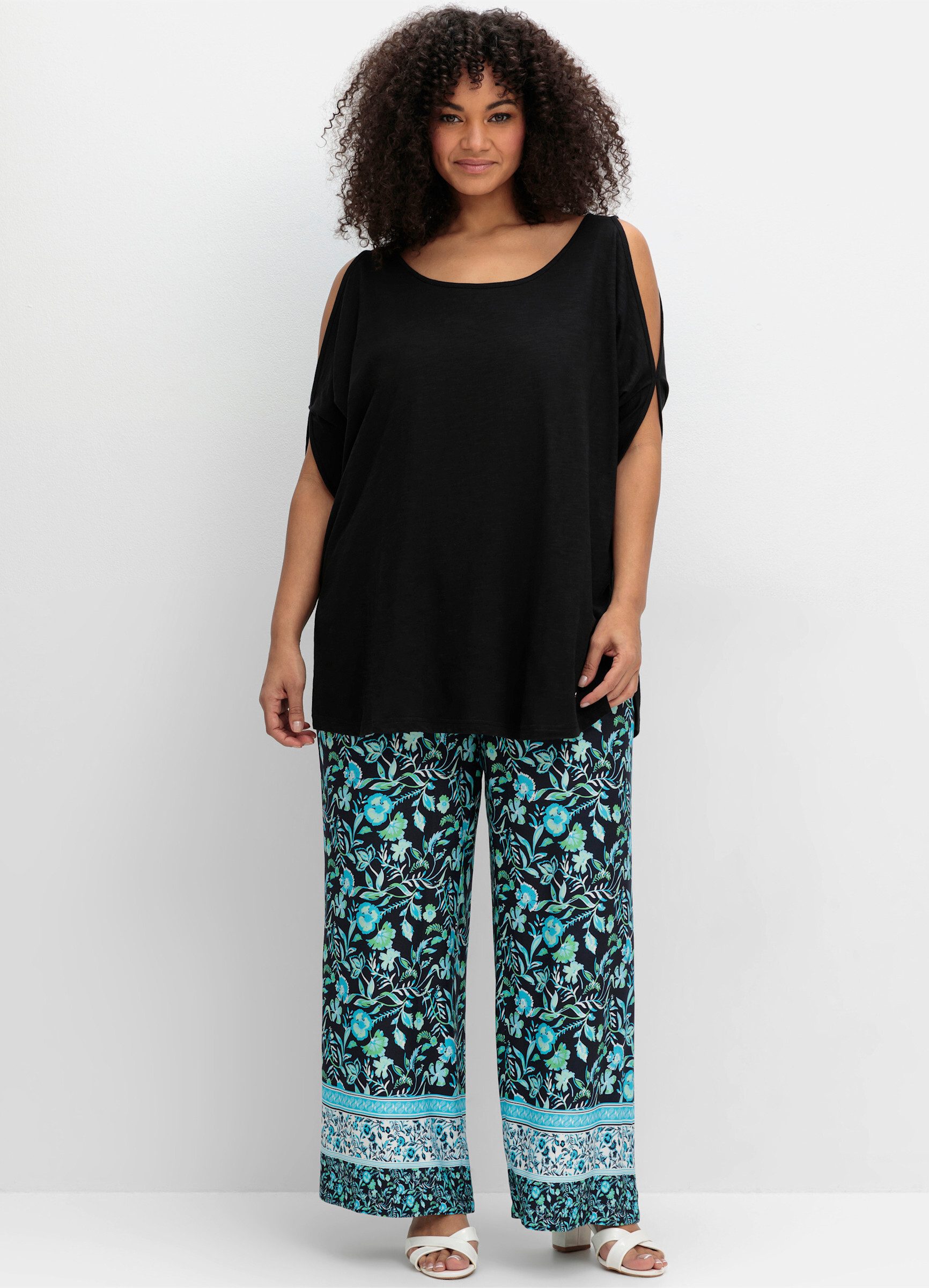 Sheego T-Shirt Fledermausshirt . mit geschlitzten Fledermausärmeln günstig online kaufen