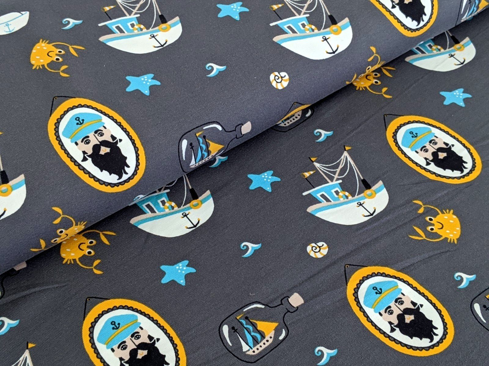 CORILEO Stoff French Terry Seemann Geschichten Grau Stoff Meterware