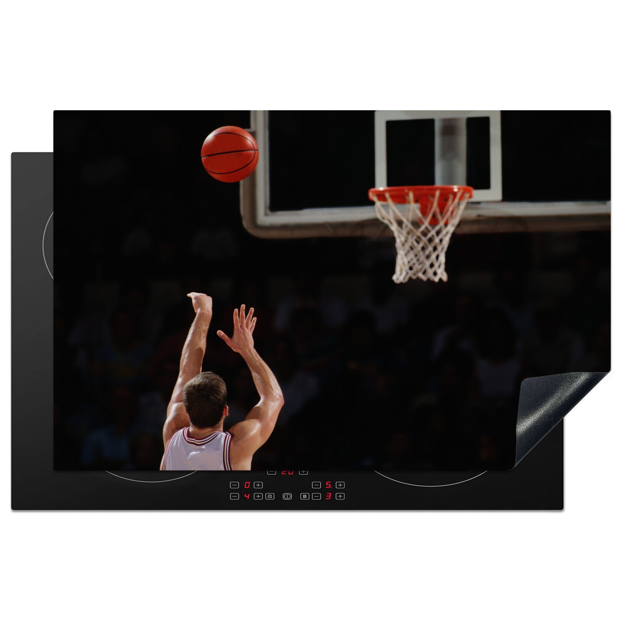 MuchoWow Herdblende-/Abdeckplatte Ein Basketballspieler wirft den Ball aus der Ferne in den Korb, Vinyl, (1 tlg), 81x52 cm, Induktionskochfeld Schutz für die küche, Ceranfeldabdeckung