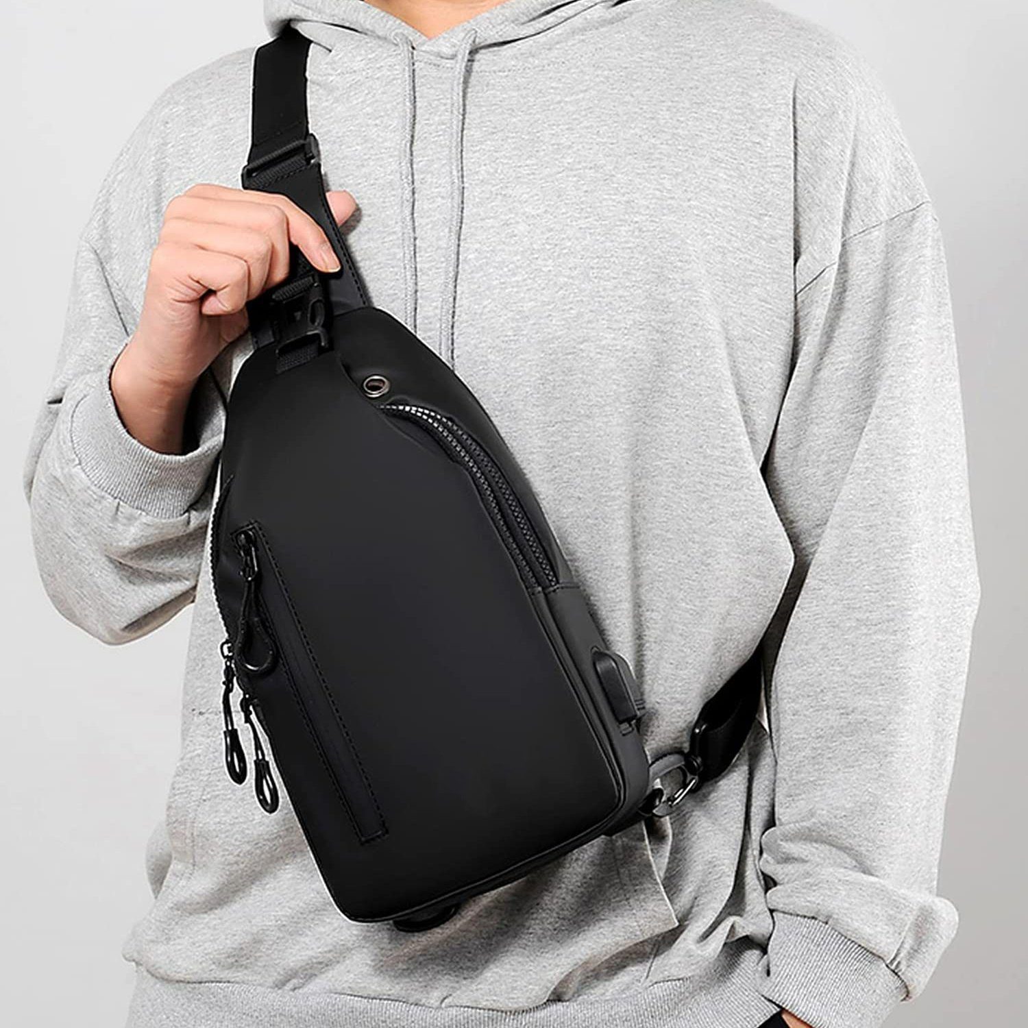 GelldG Umhängetasche Anti-Diebstahl Sling Bag Tasche wasserdicht Schwarz mit USB-Ladeanschluss